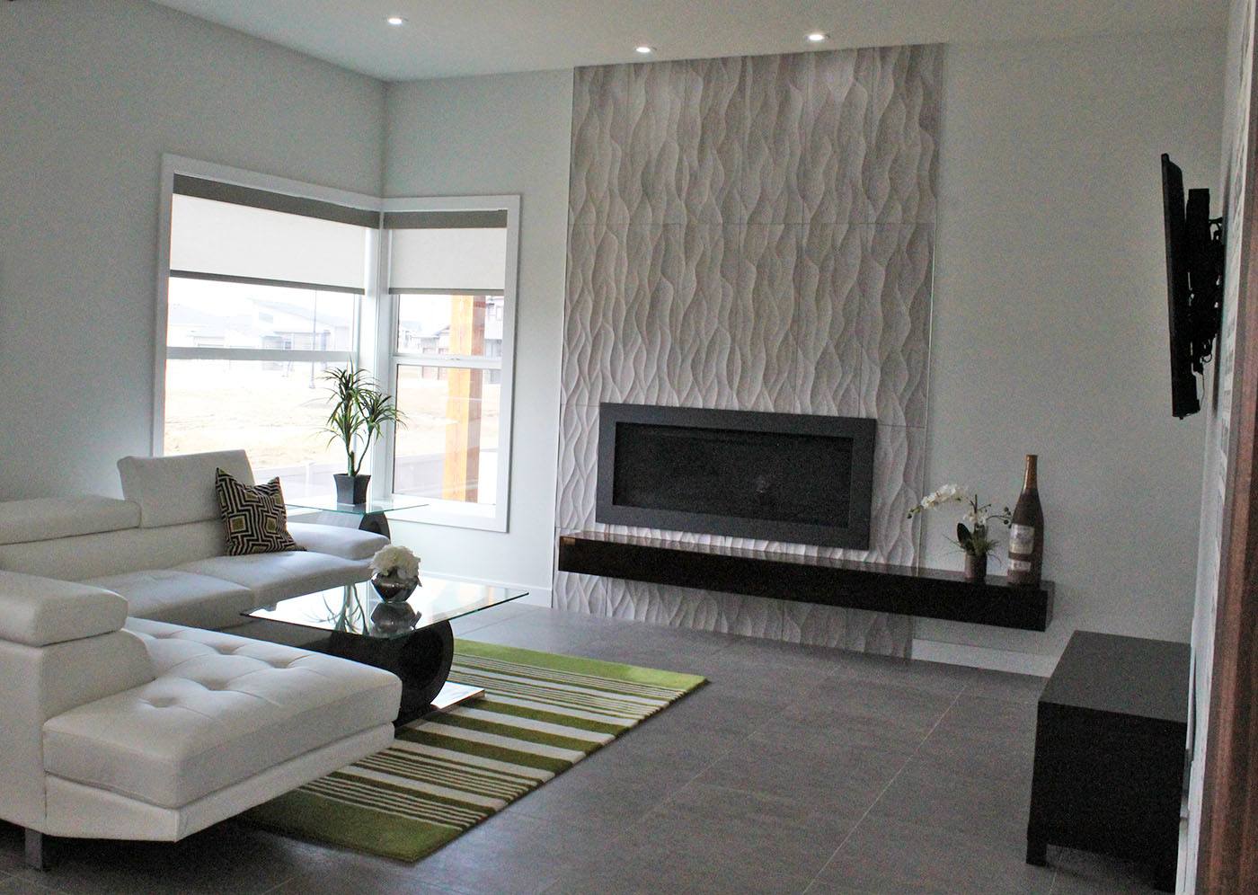 MODERN TOUCH - A modern style living room is one of the many features of a Bella Rosa Developments home on Lindman Avenue.