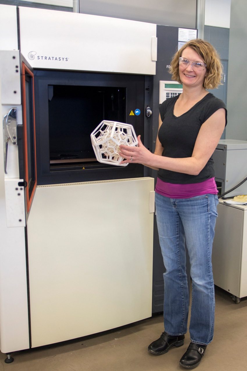 STATE-OF-THE-ART – Alicia Cafferata-Arnett stands with a product recently removed from the manufacturing grade 3D printer at the RDC Centre for Innovation and Manufacturing.