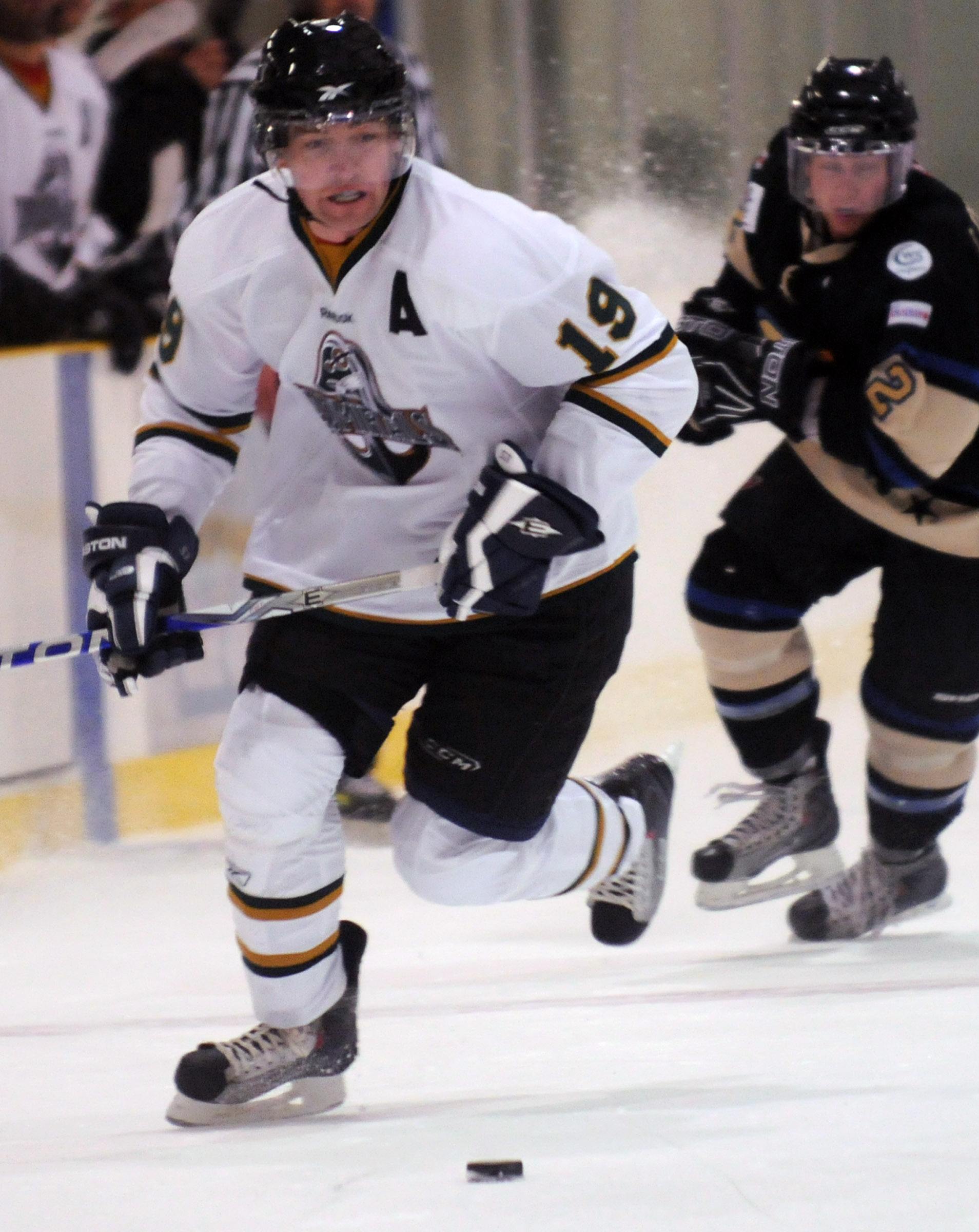 QUICK STEAL-Ryan Carter of the Sylvan Lake Admirals takes off after the puck Saturday night during the game against the Bentley Generals.