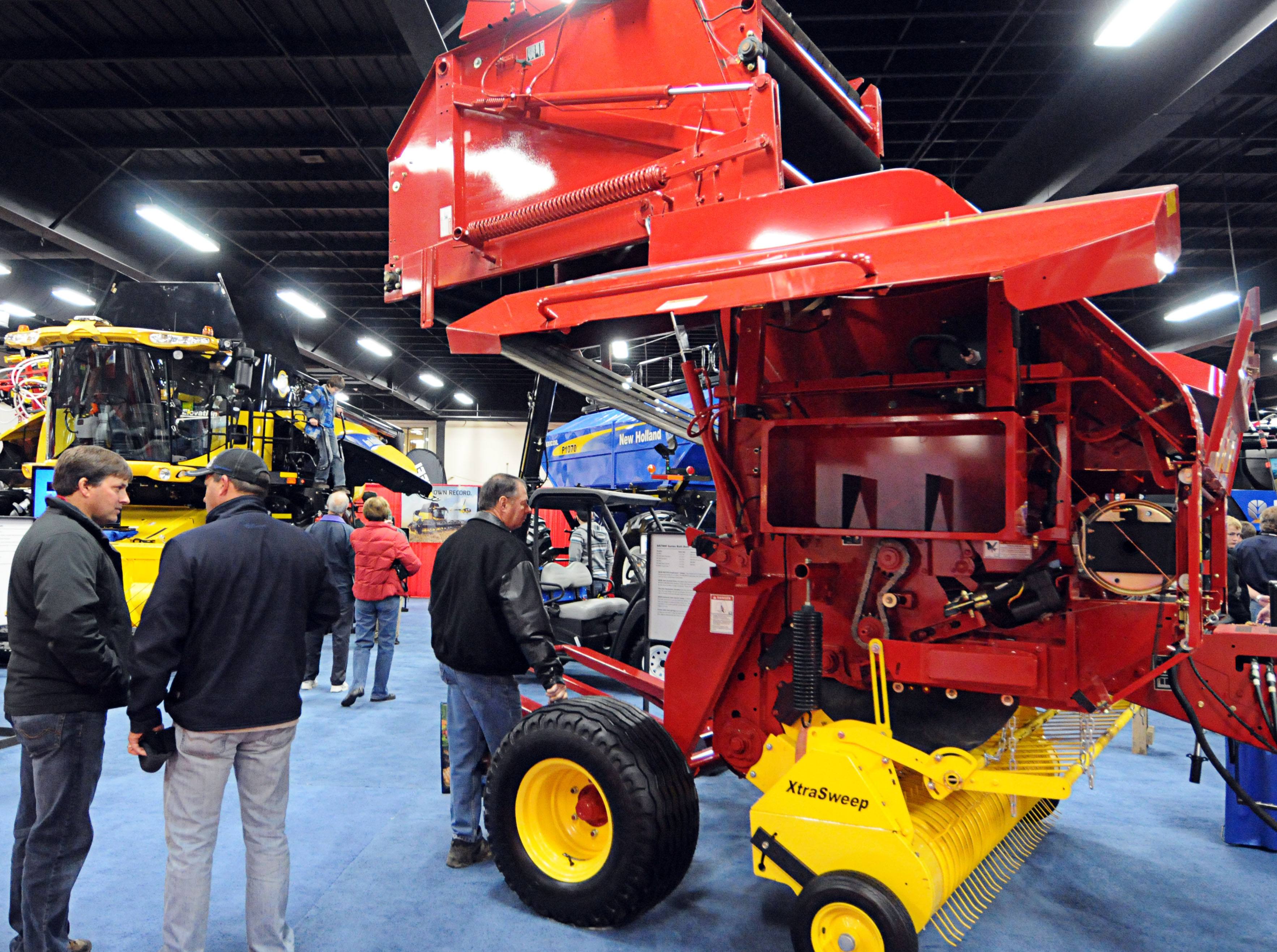 CUTTING EDGE – Visitors of the annual Agri-Trade exposition check out the various exhibits on display. Agri-Trade is an agricultural equipment exposition that was held at the Westerner last week.