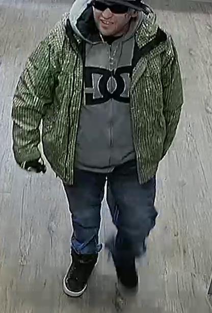 WANTED - Pictured here is the suspect police are seeking after a robbery at Bower Liquor on Monday.