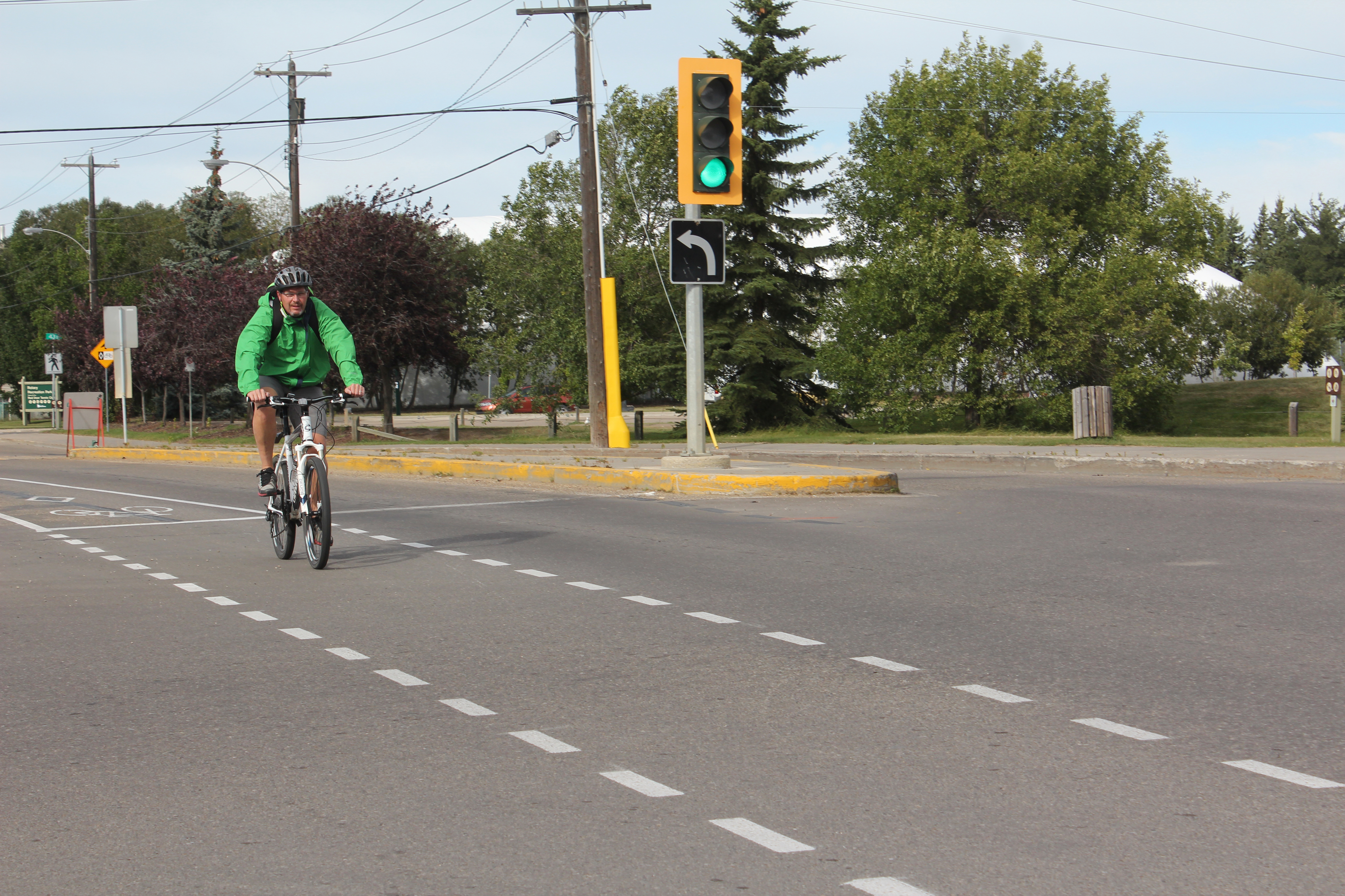 NEW LANES - Trevor Aslin utilizes the new bike lanes in Red Deer recently.
