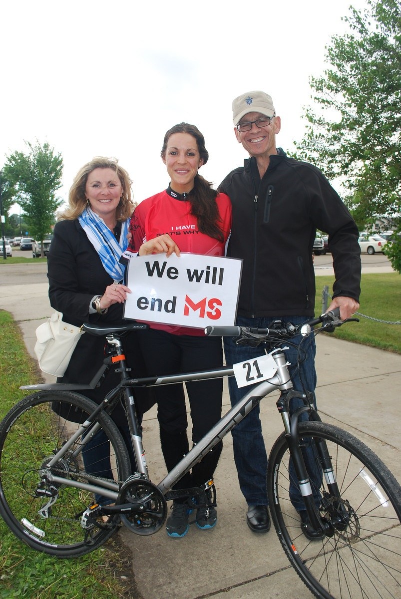 FAMILY SUPPORT - Bre Fitzpatrick (centre) is flanked by her parents Donna Fitzpatrick and Brian Fitzpatrick at the 2012 MS Bike tour. Bre works as a development coordinator with the local MS Society chapter and was diagnosed with MS in 2010.