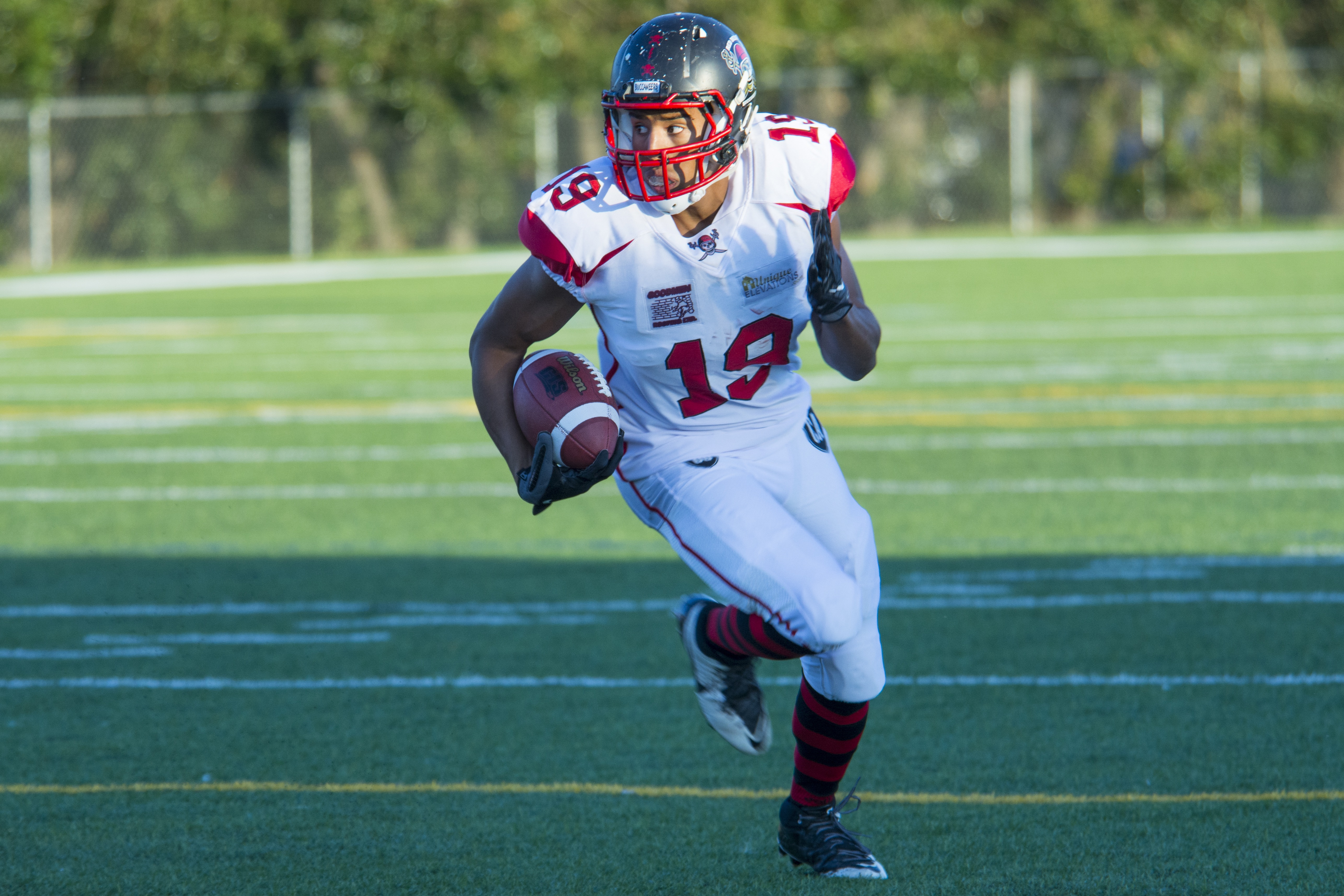 BIG WIN – Buccaneers receiver Axsivier Lawrence returns the ball up the field during a game against the Edmonton Stallions last Saturday evening at ME Global Athletic Park in Lacombe.