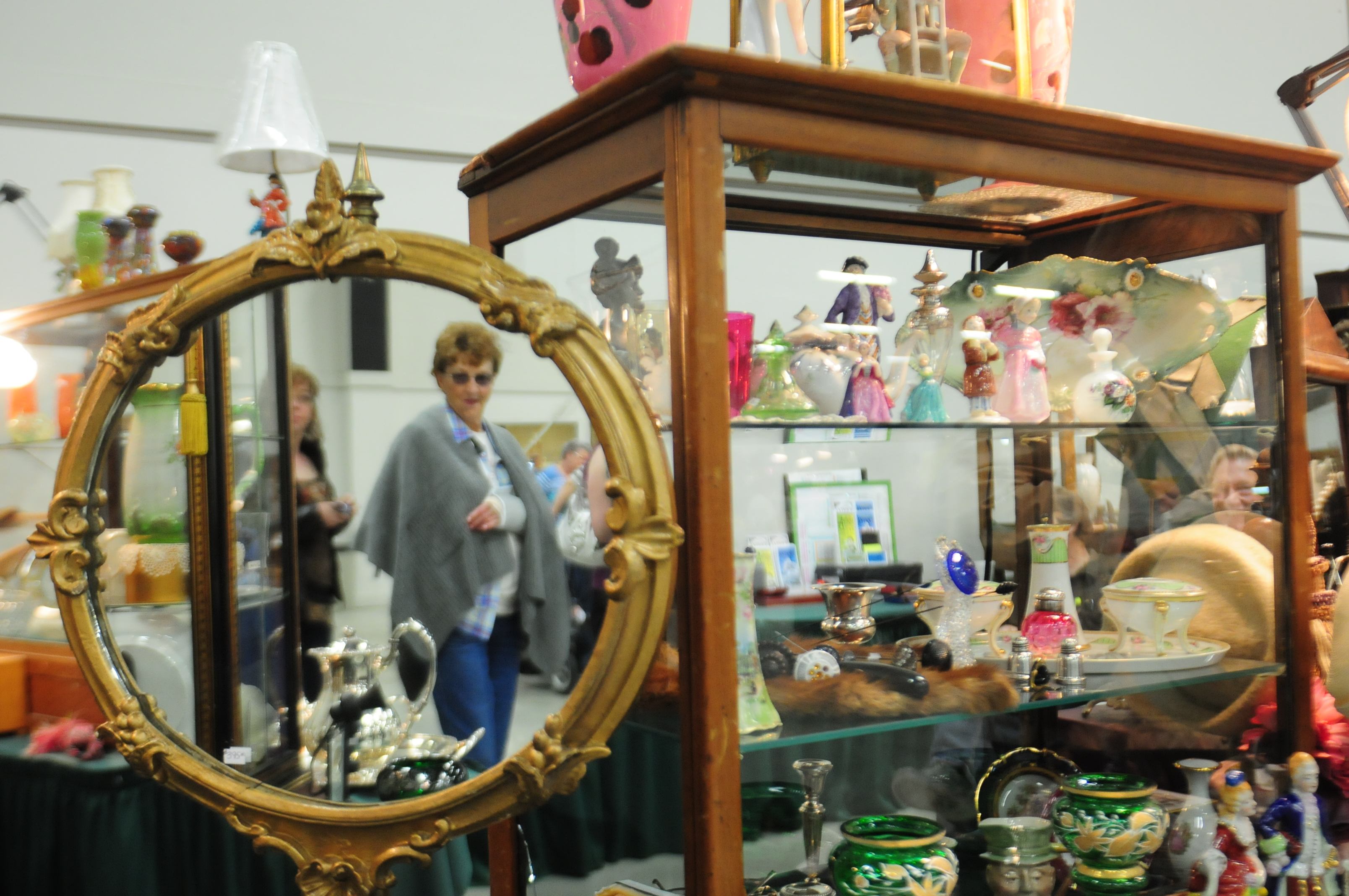 TREASURE HUNTERS- Antique enthusiasts looked over tables that were filled with small treasures during the Red Deer Antique Show and Sale this past weekend at the westerner.