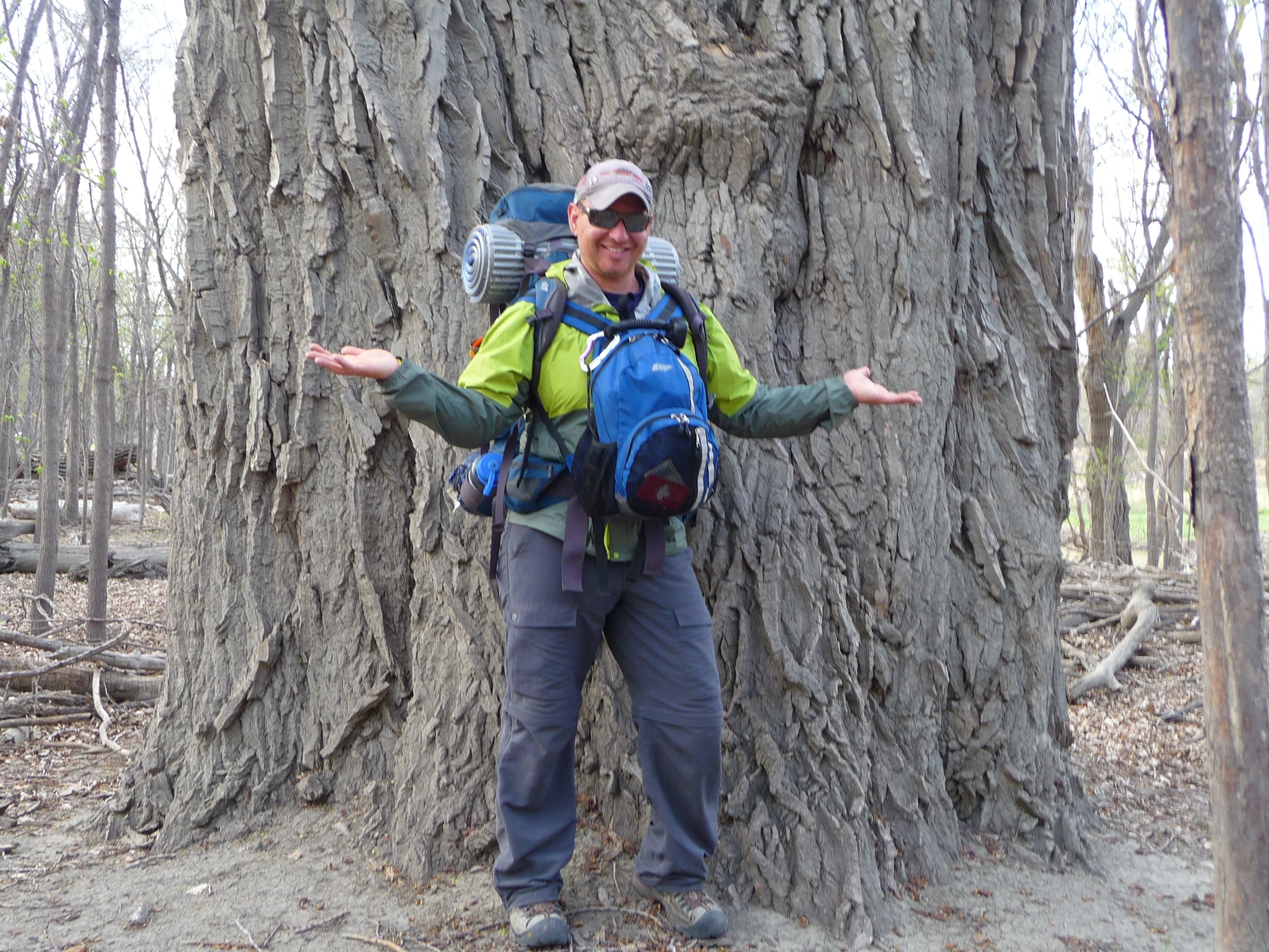TREKKER – Dana Meise poses by an enormous tree near Emerson