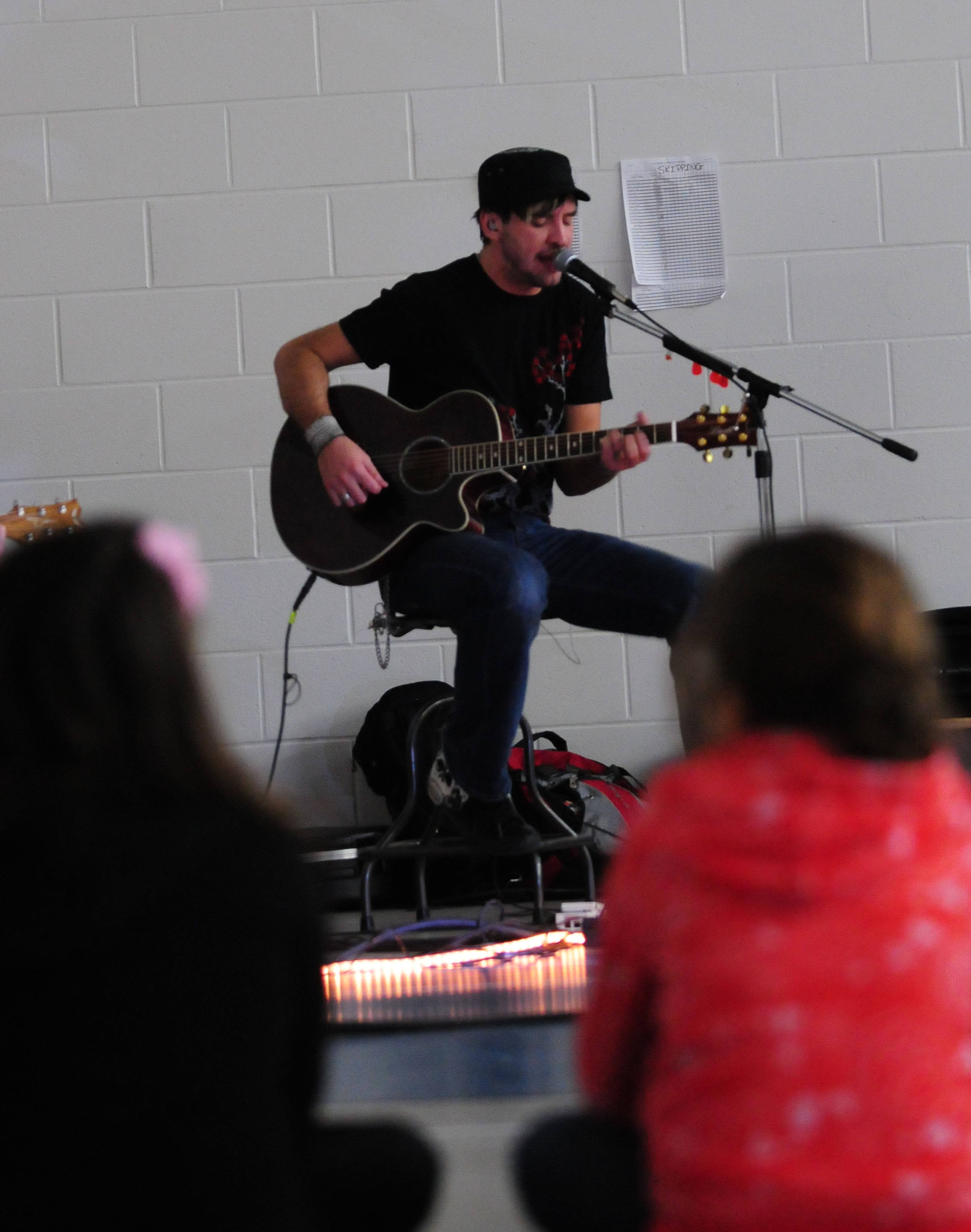 HOPEFUL MESSAGE—Singer Robb Nash brought his message of the importance of making positive choices to students at the G.H. Dawe School on Tuesday.