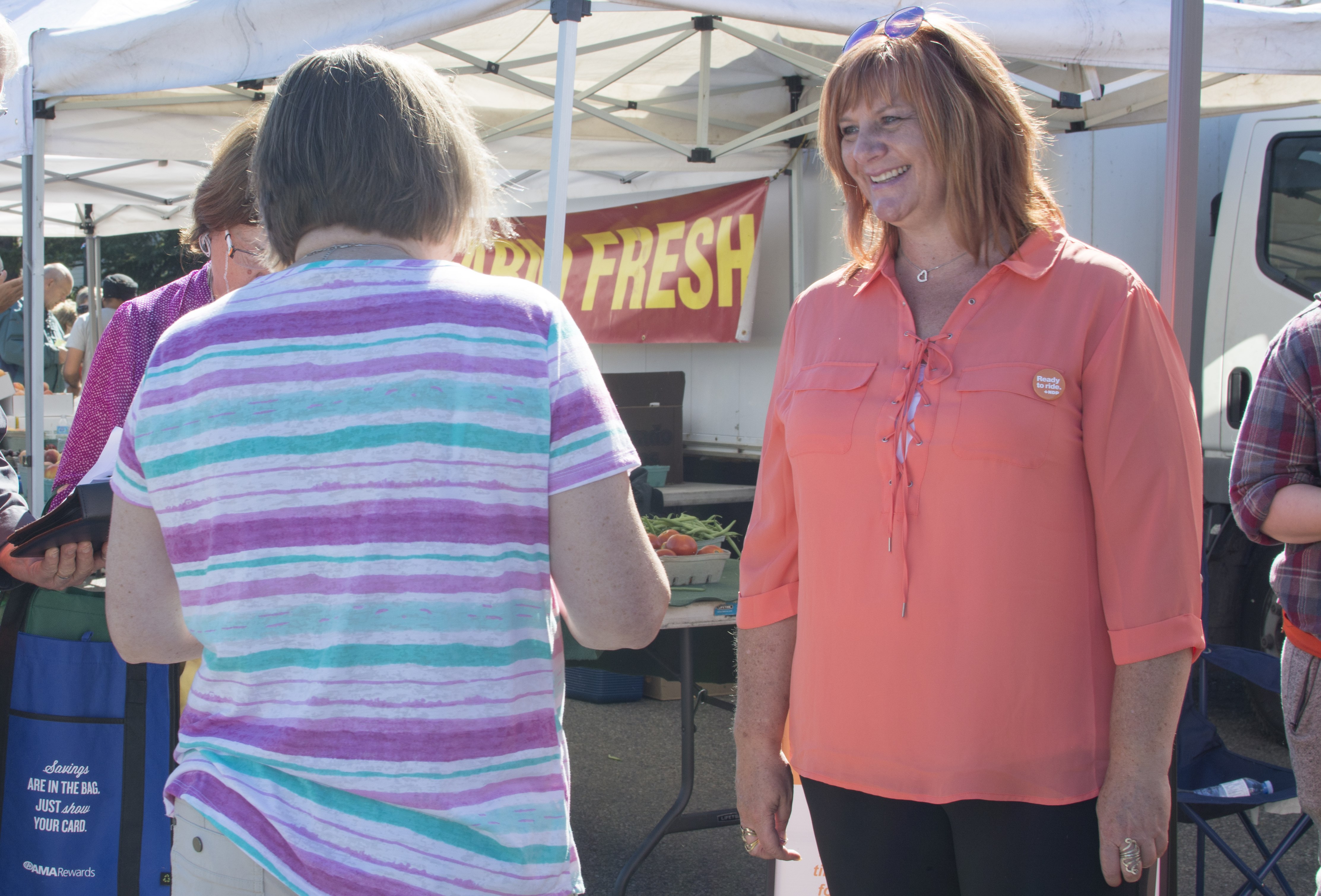 ENGAGED – Dianne Macaulay interacts with residents during the Red Deer Farmers’ Market during a recent NDP Day of Action. Macaulay hopes to be named the NDP candidate in the federal election for the Red deer – Mountain View riding on Aug. 24th.