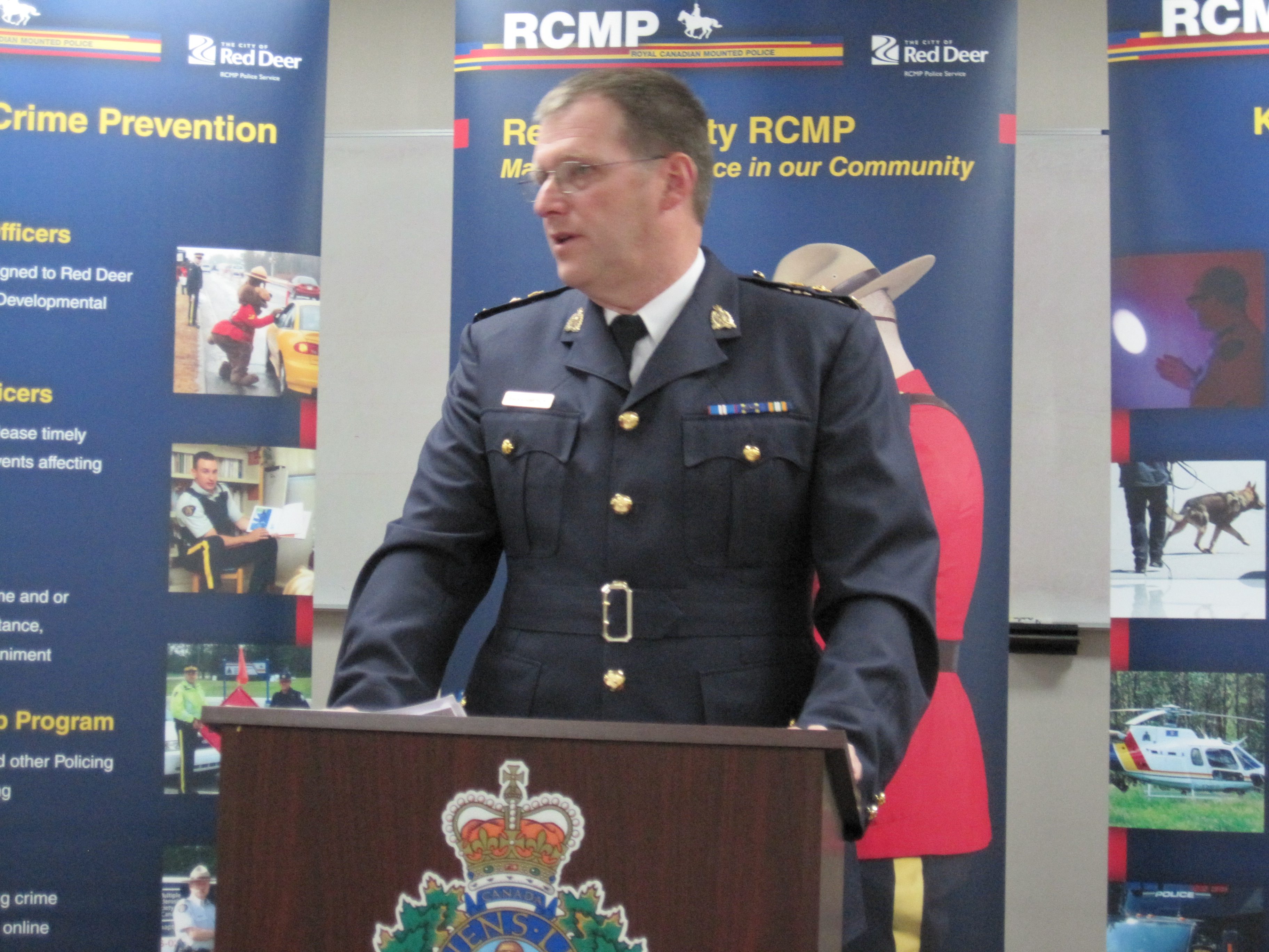 BIG SWEEP-Red Deer city RCMP Supt. Brian Simpson addresses the media Wednesday on the local detachment's big street bust.