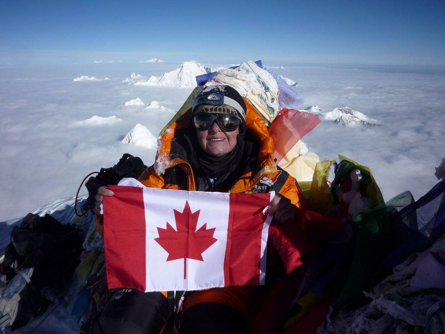 UNFORGETTABLE- Mountain climber Lucille de Beaudrap poses at the summit of Mt. Everest this past May. The Edmonton resident was in Red Deer recently to share her experience with the Parkland Cross Country Ski Club