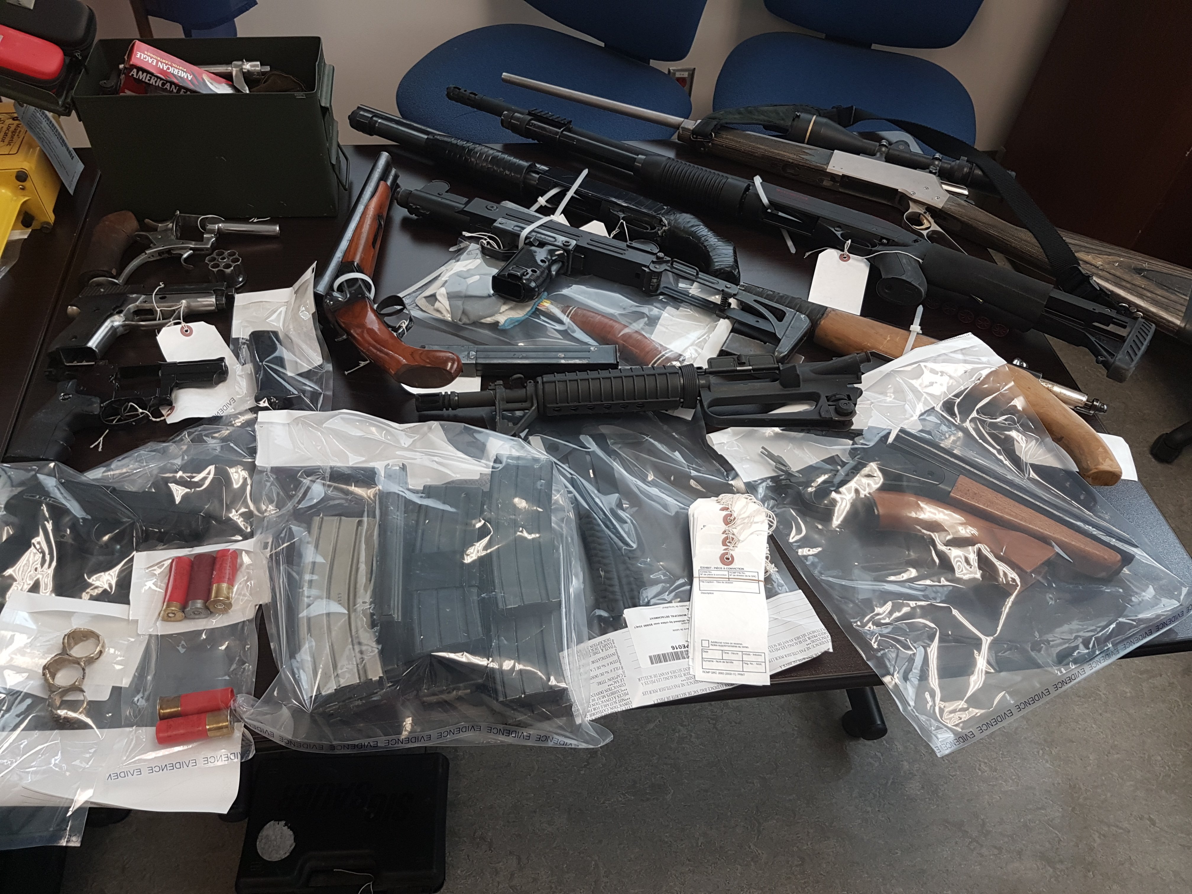 BUST - Pictured here are guns that were seized from a home in Sylvan Lake after a major bust by police.