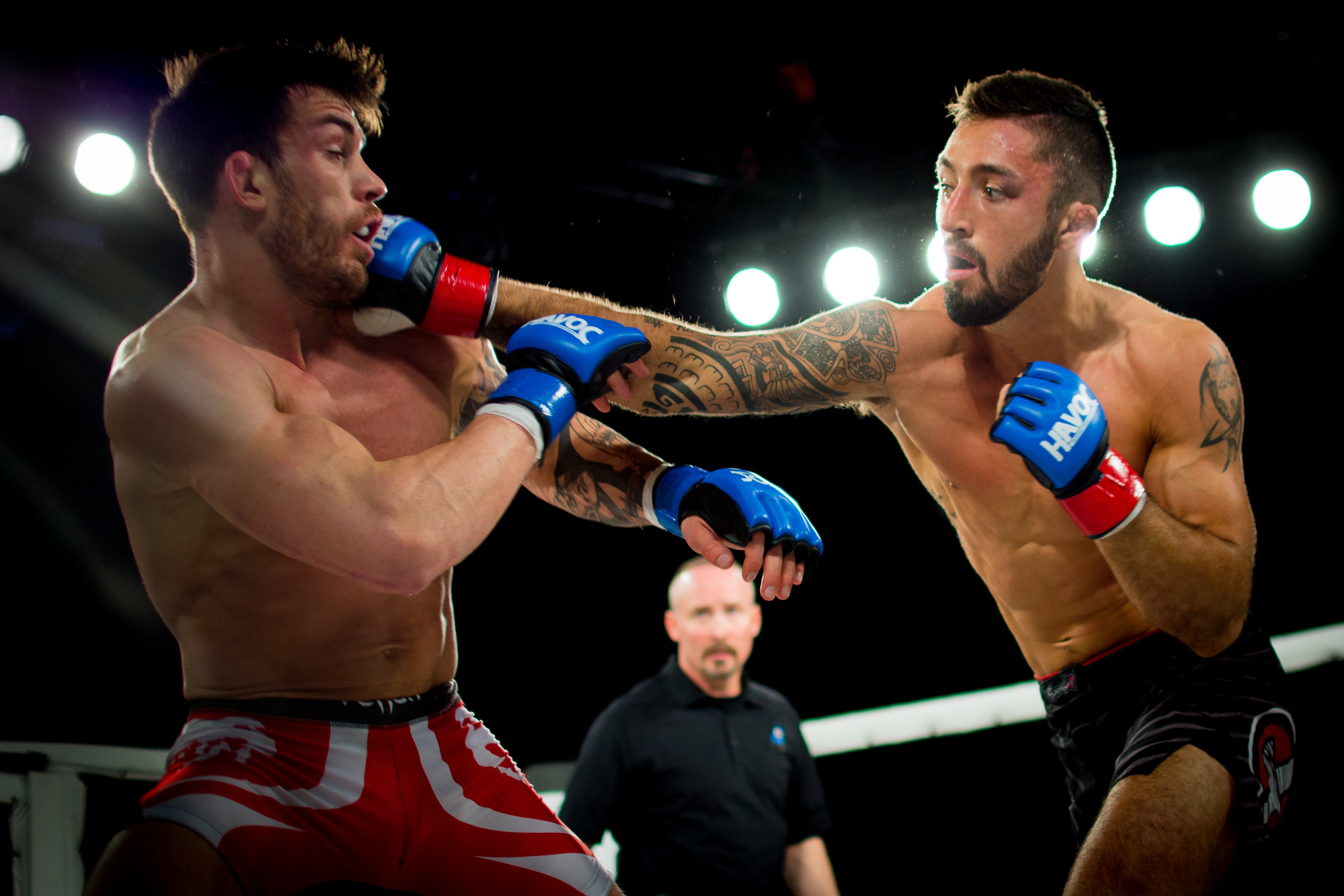 BIG HITTER – Wolfgang Jannsen out of Arashi-Do Martial Arts in Red Deer lays a right hook to the chin of Curtis Demarce during Havoc 9 at Westerner Park last Friday evening. Jannsen took the win by unanimous decision.