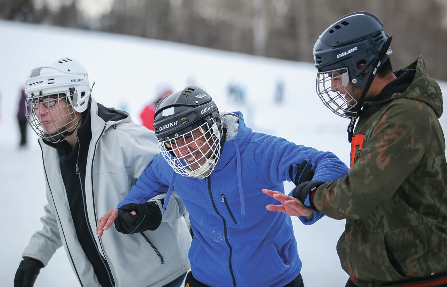 NEW SKILL - Mohammed Abady laughed after slipping and falling while learning how to skate during a Learn to Skate session for immigrant youth at Bower Ponds recently. The event was hosted by C.A.R.E.