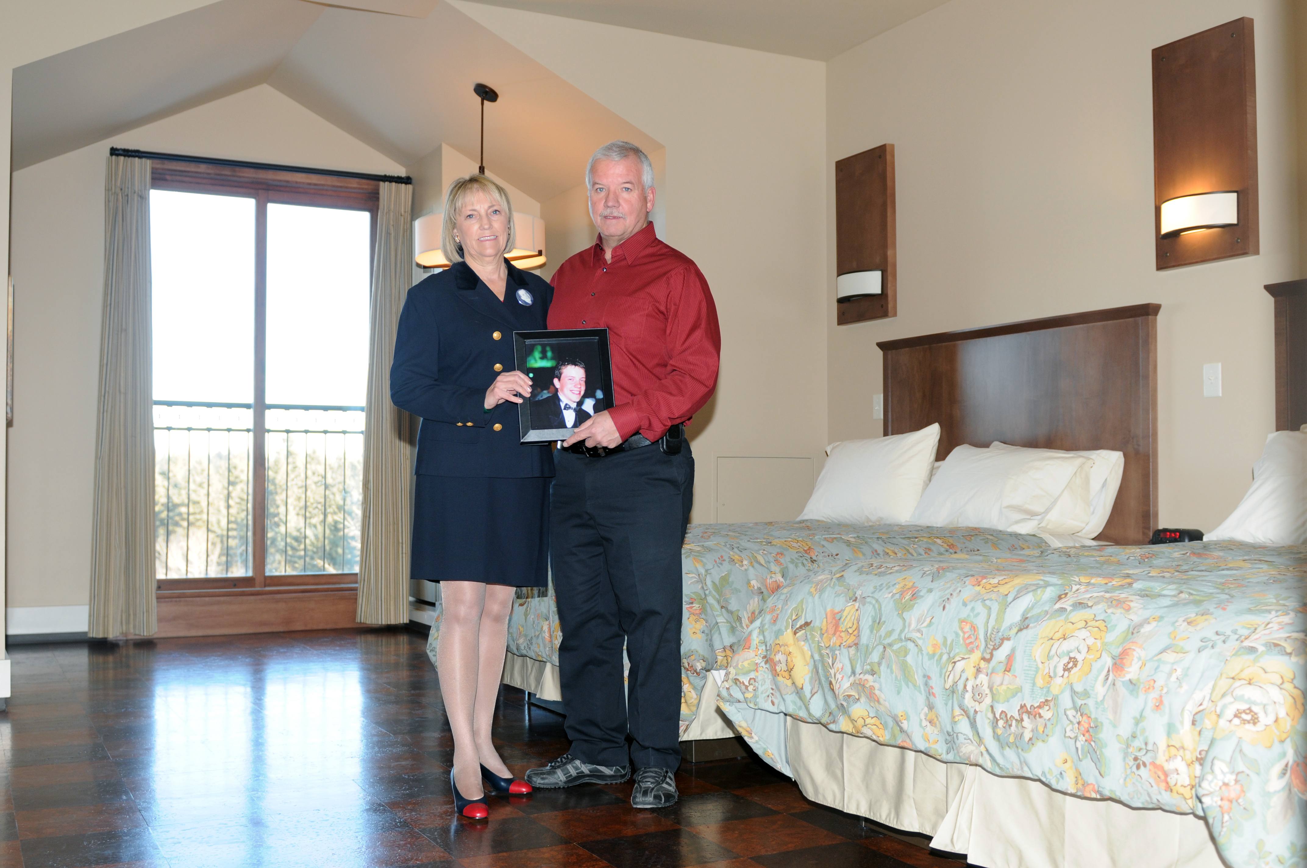 LASTING MEMORY- Aleta and Rick Neville stand in the Nev Suite at the Ronald McDonald House