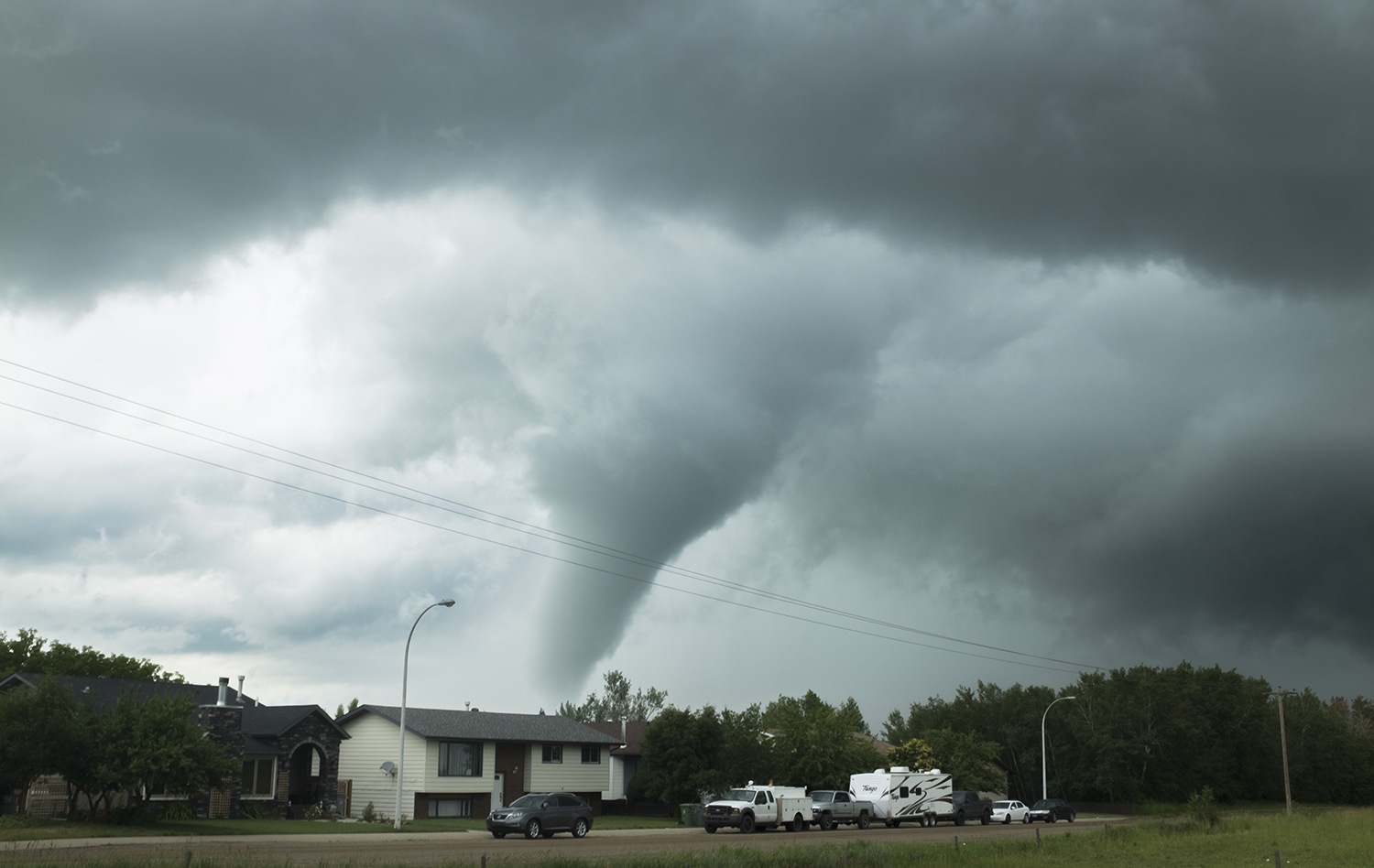 MOTHER NATURE - A tornado touched down in Ponoka June 30th causing damage to five homes but leaving no injuries. After an inspection Environment Canada confirmed the event stating it was an Enhanced Fujita Scale Zero. The funnel cloud lasted for several minutes.