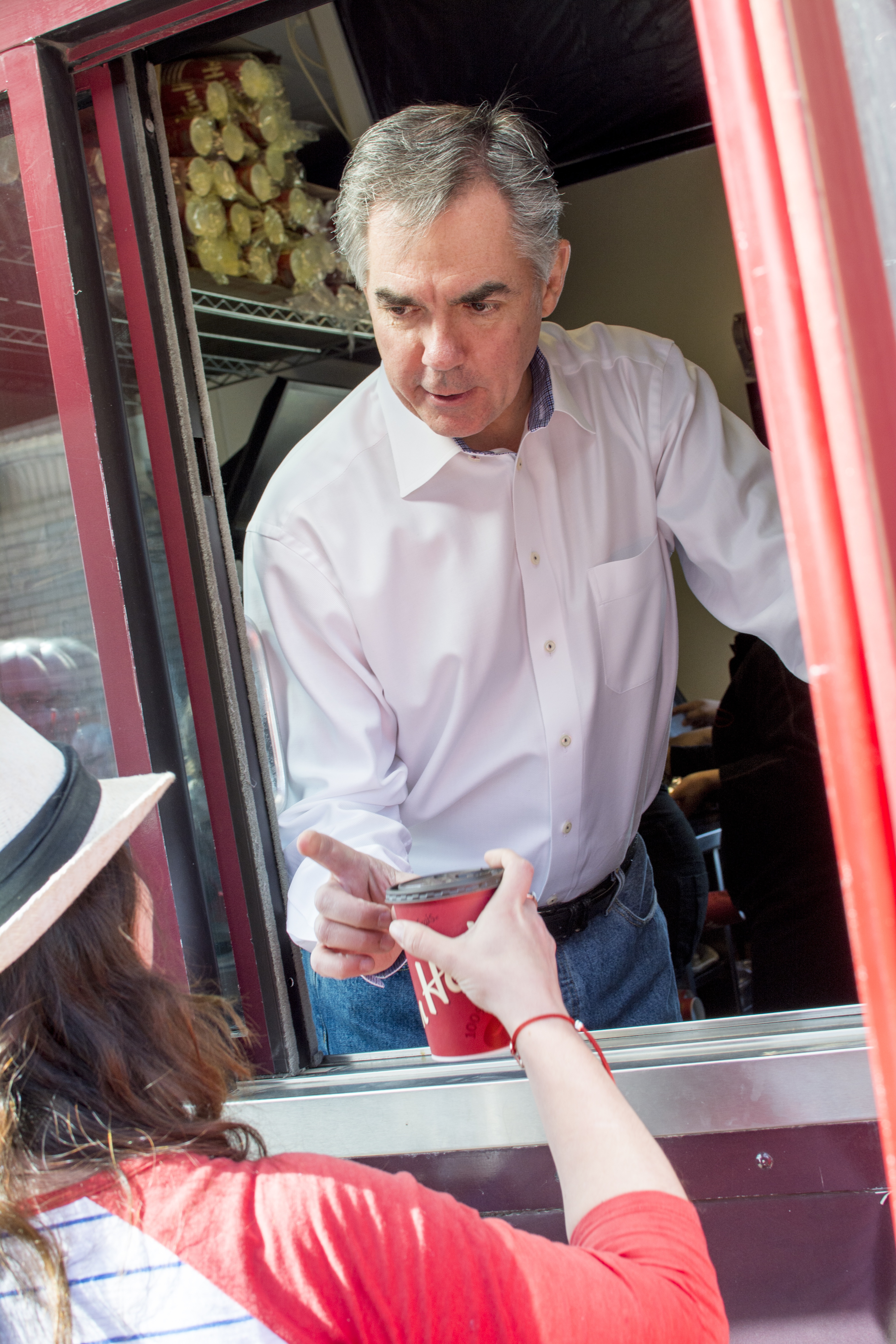 COFFEE CHAT – Premier Jim Prentice was recently in Red Deer to pour coffee for patrons at the Gasoline Alley Tim Hortons during a campaign stop.