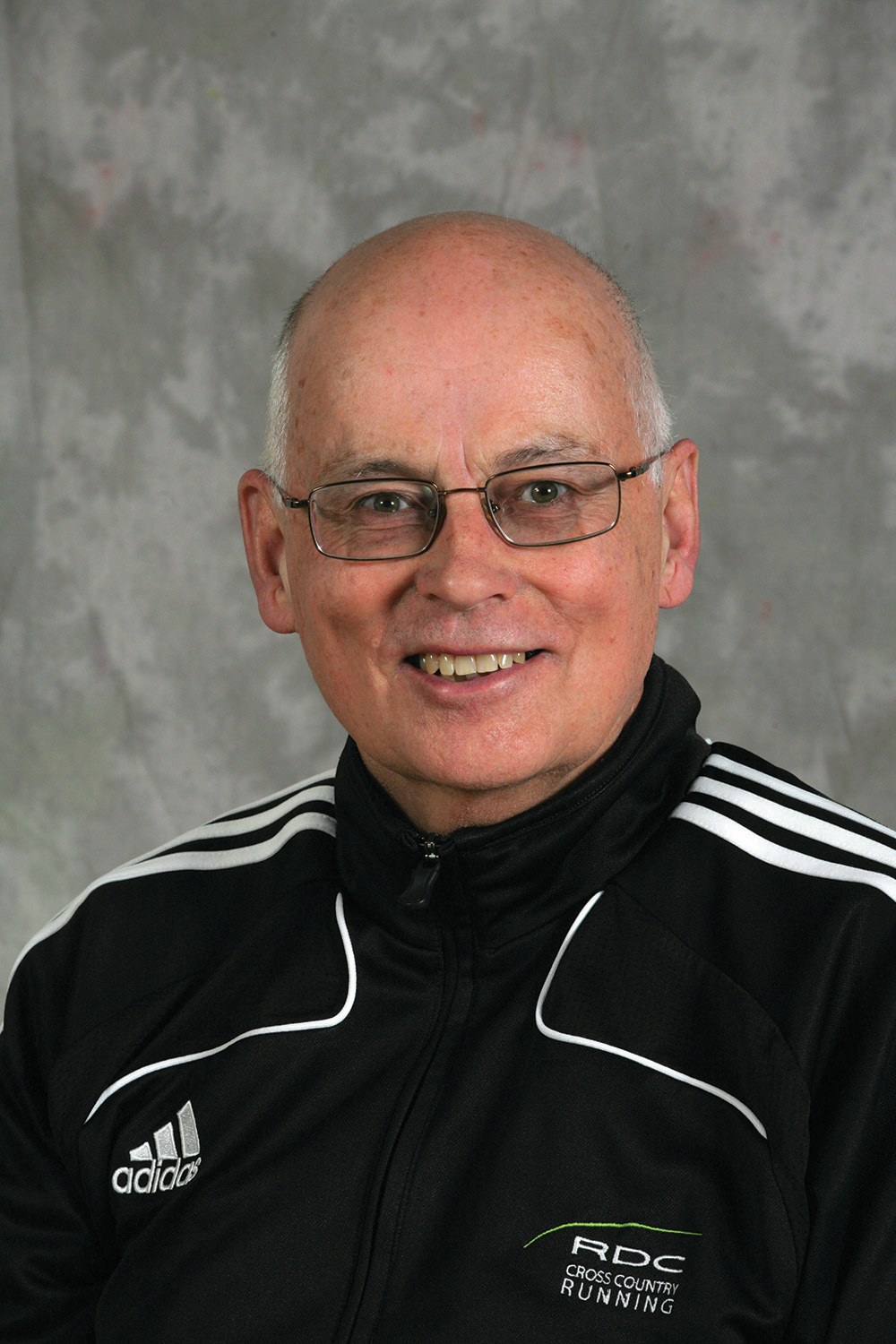 FINISHING STRONG- Long-time RDC Cross Country running Coach Brian Stackhouse was presented with the 2016 CCAA Coaching Excellence Award in a special ceremony