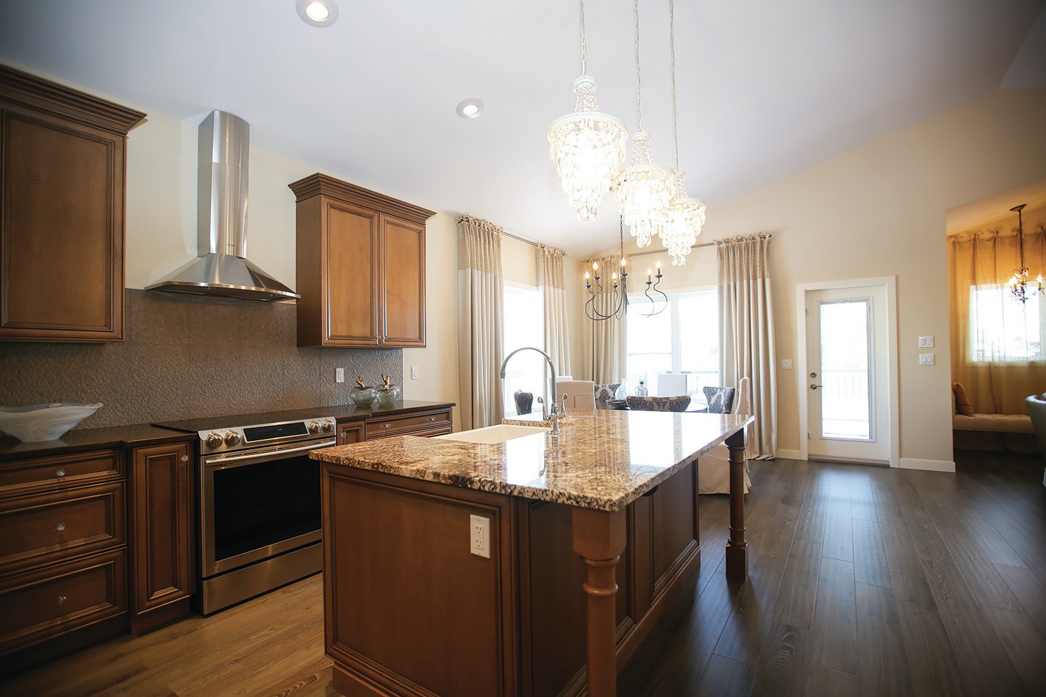 CLEAN LINES - This kitchen area in an Abbey Master Builders show home in Clearview shows how traditional design can be blended with modern elements to create something completely unique.