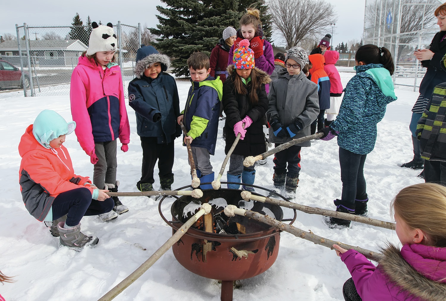 HANDS ON - Students at St. Martin de Porres School learned how to cook bannock during a special Canada 150 celebration at the school.