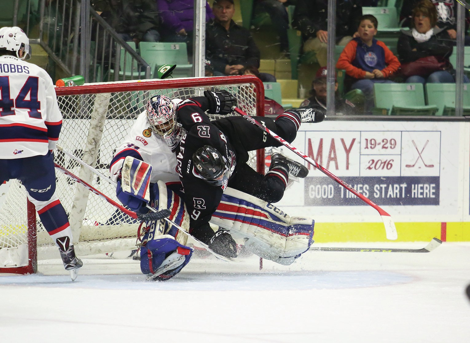 BIG HIT - Conner Bleackley of the Red Deer Rebels collided with goaltender Tyler Brown of the Regina Pats during regular season action at the Centrium last week. The Pats defeated the Rebels 3-2.