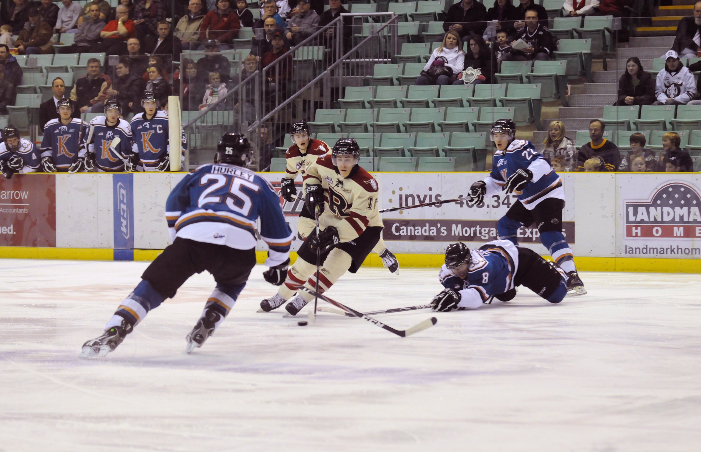 TOUGH DEFENSE- Red Deer Rebel Ryan Nugent-Hopkins dodges players during WHL action Saturday night against Kootenay. The Rebels won 6-4.