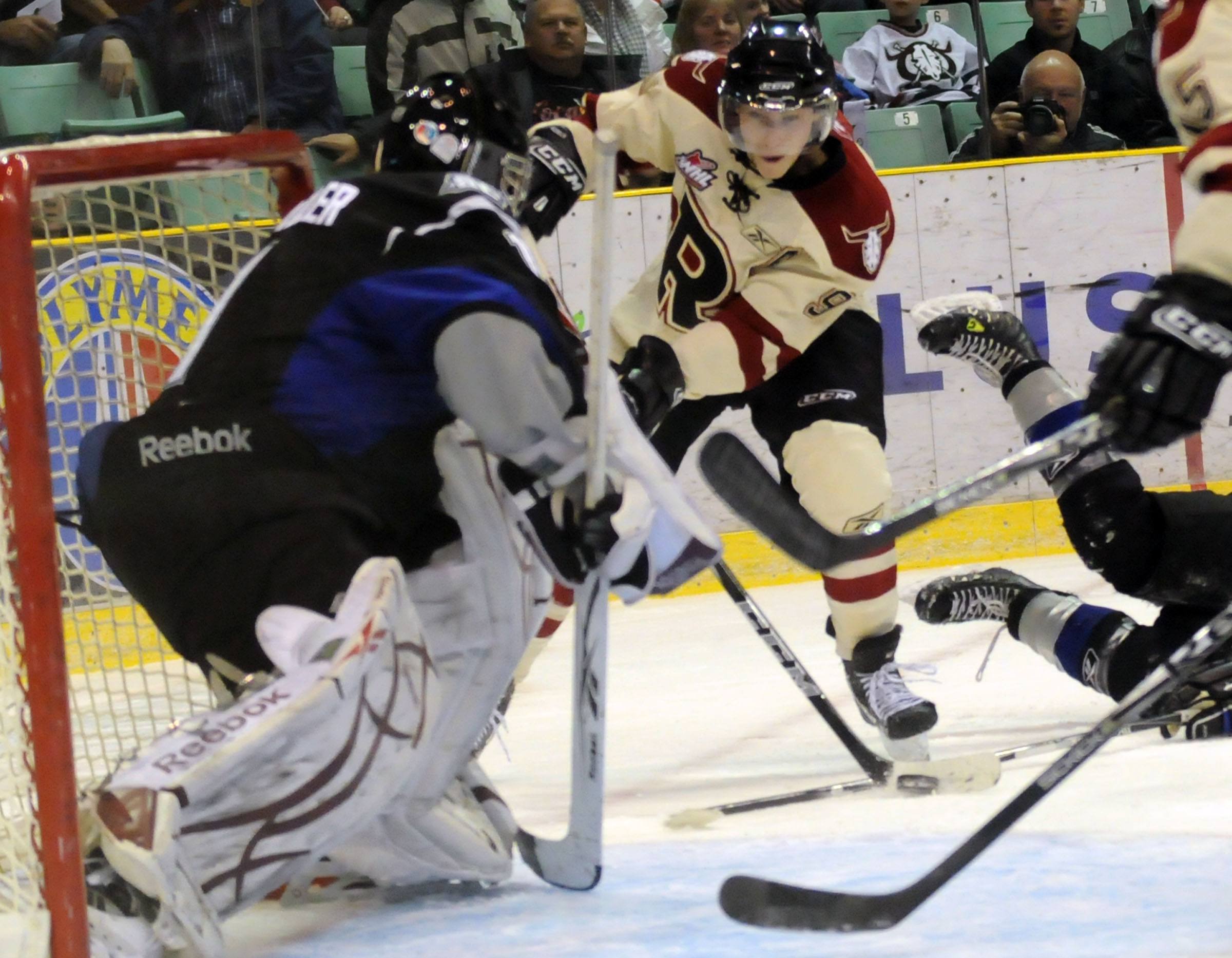 SCORE- The Red Deer Rebels out shot the Swift Current Broncos with a 4-2 win Friday night at the Enmax Centrium. The Rebels scored all four goals in the first period with a total of 35 shots on net.