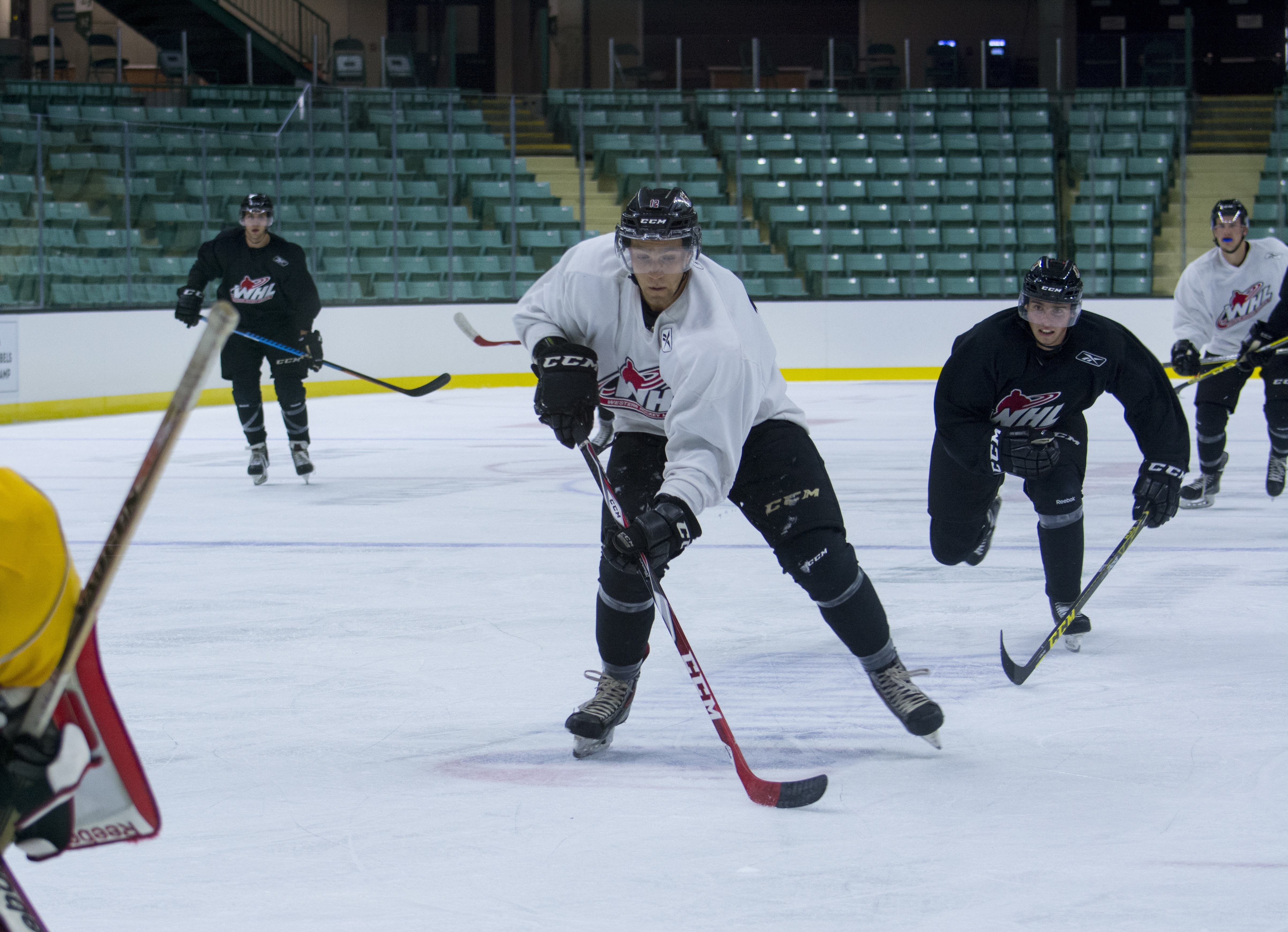 NEW SEASON – Red Deer Rebel Preston Kopeck beats his defender and rushes towards the net during a Monday night scrimmage at the Enmax Centrium during the Red Deer Rebels training camp.