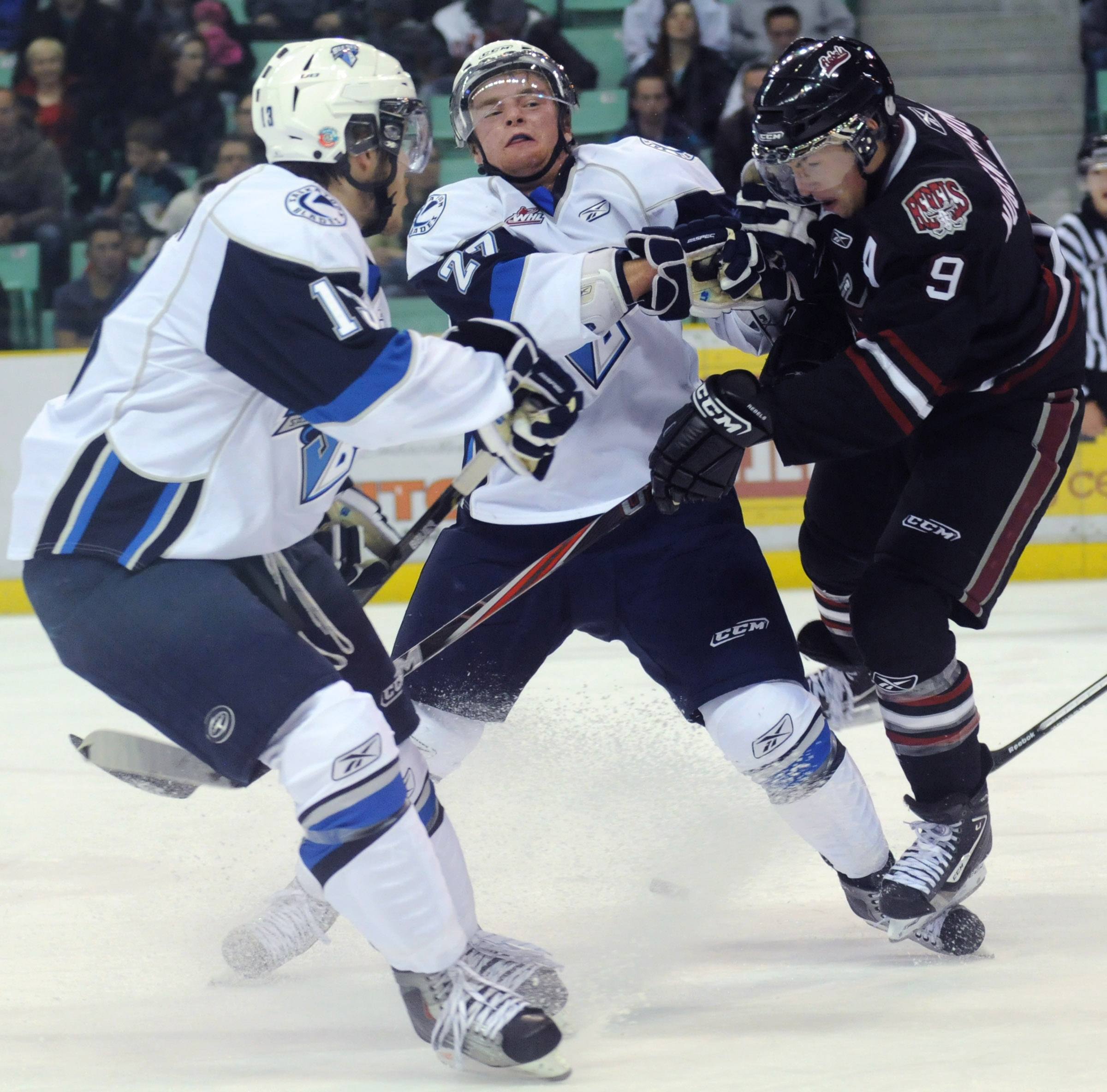 COLLISION- Ryan Nugent-Hopkins of the Red Deer Rebels smashes into Brent Benson during WHL action Friday night. The Rebels lost 2-1.