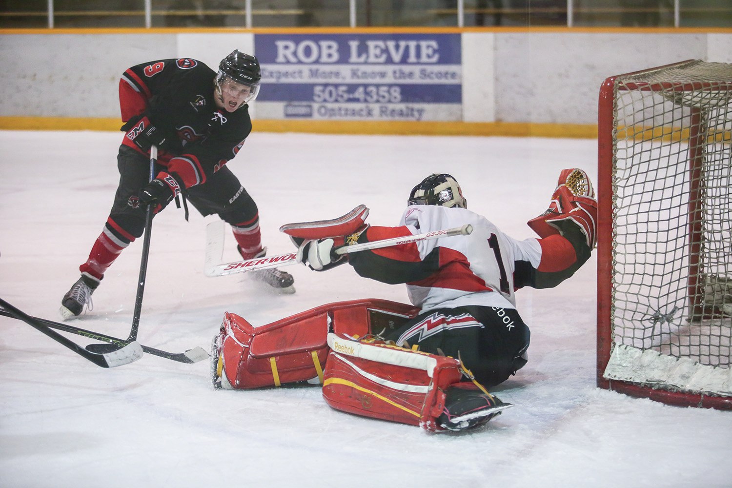BIG SAVE - Tye Munro of the Red Deer Vipers tried to put the puck past Kade Taplin of the Airdrie Thunder during Heritage Junior Hockey League action at the Red Deer Arena last weekend. The Vipers toppled the league-leading Thunder 4-3 in overtime.