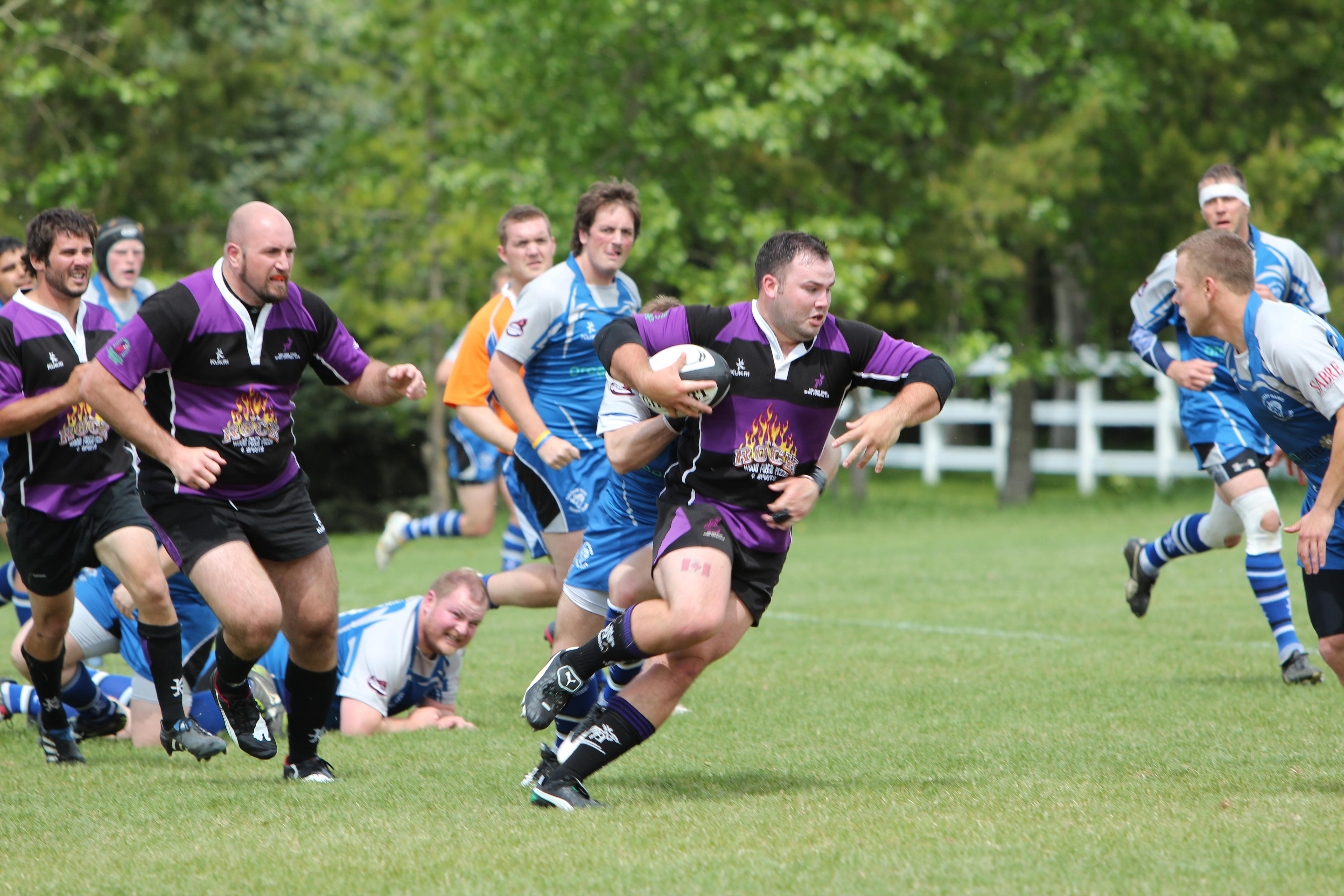 BRING HIM DOWN - The Red Deer Titans Rugby Senior Men’s team