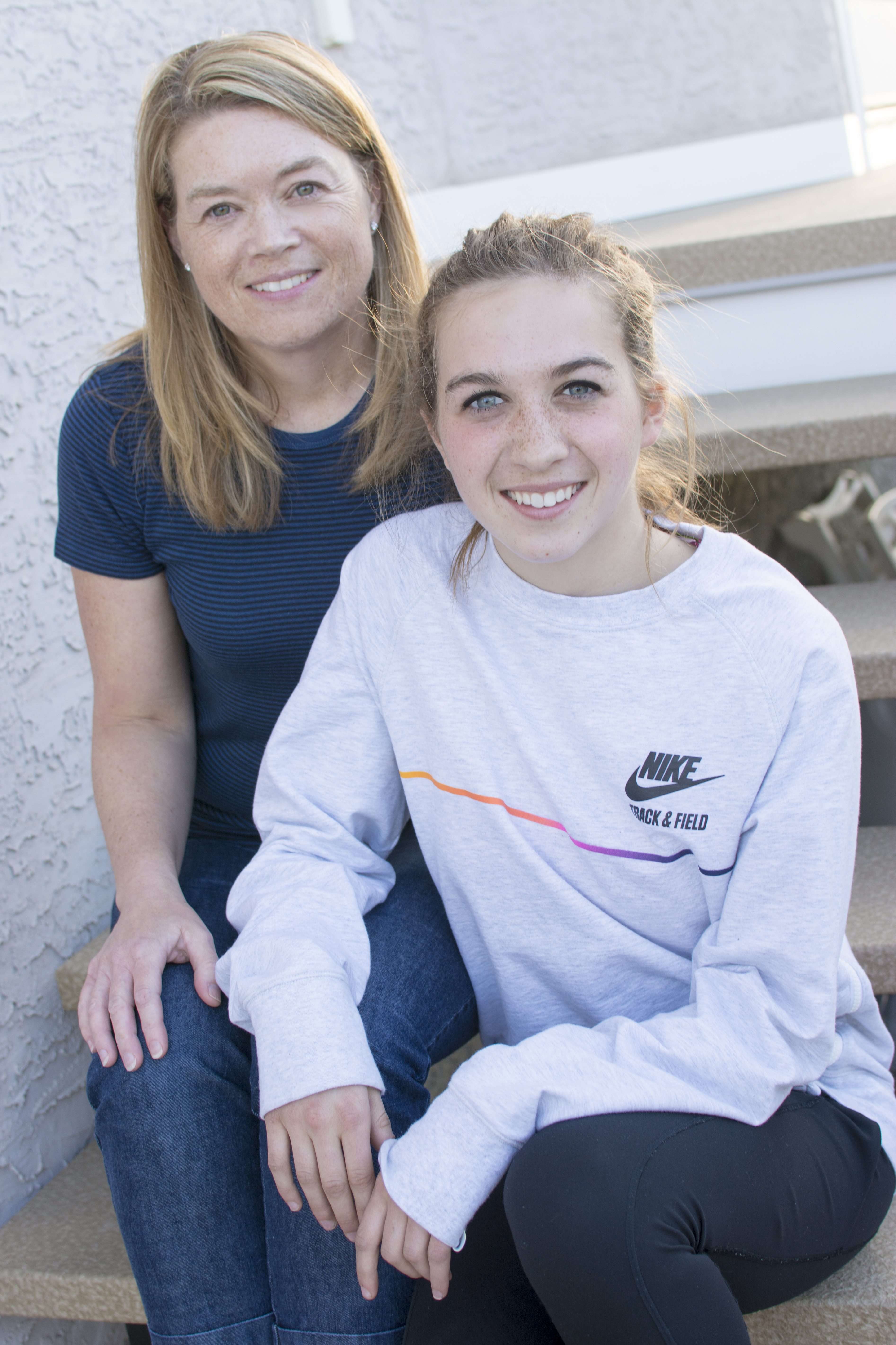 BRIGHT FUTURE - Dawn Iatrou and her daughter Dina enjoy some time together in the backyard of their Deer Park home. Dina recently learned she has landed a scholarship for her coming university studies thanks to her passion for running – something she shares with her mother.