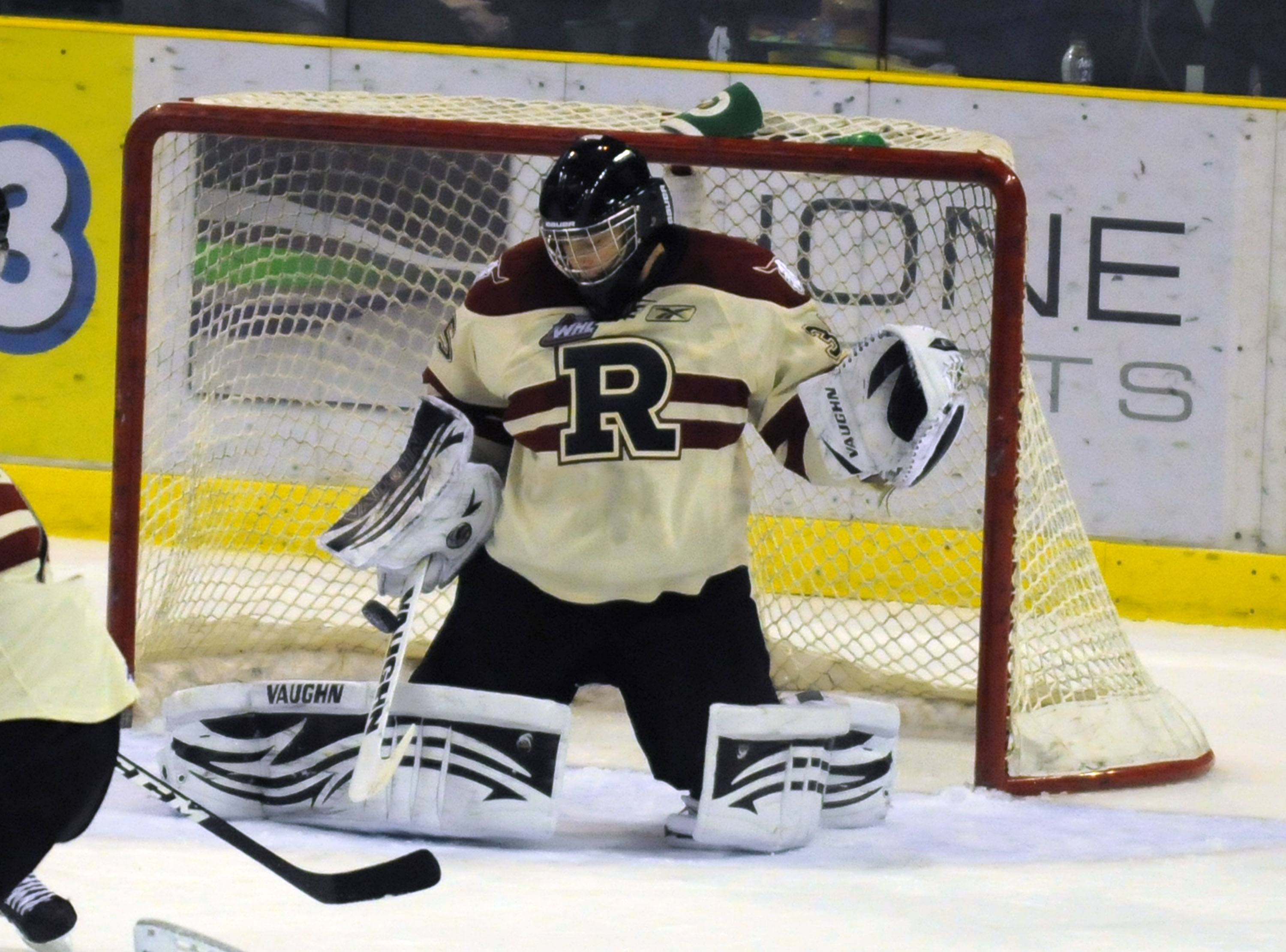 SAVE-- Red Deer Rebel Darcy Kuemper makes a save during WHL action Friday night but the Regina Pats snuck two goals giving them the 2-1 win.