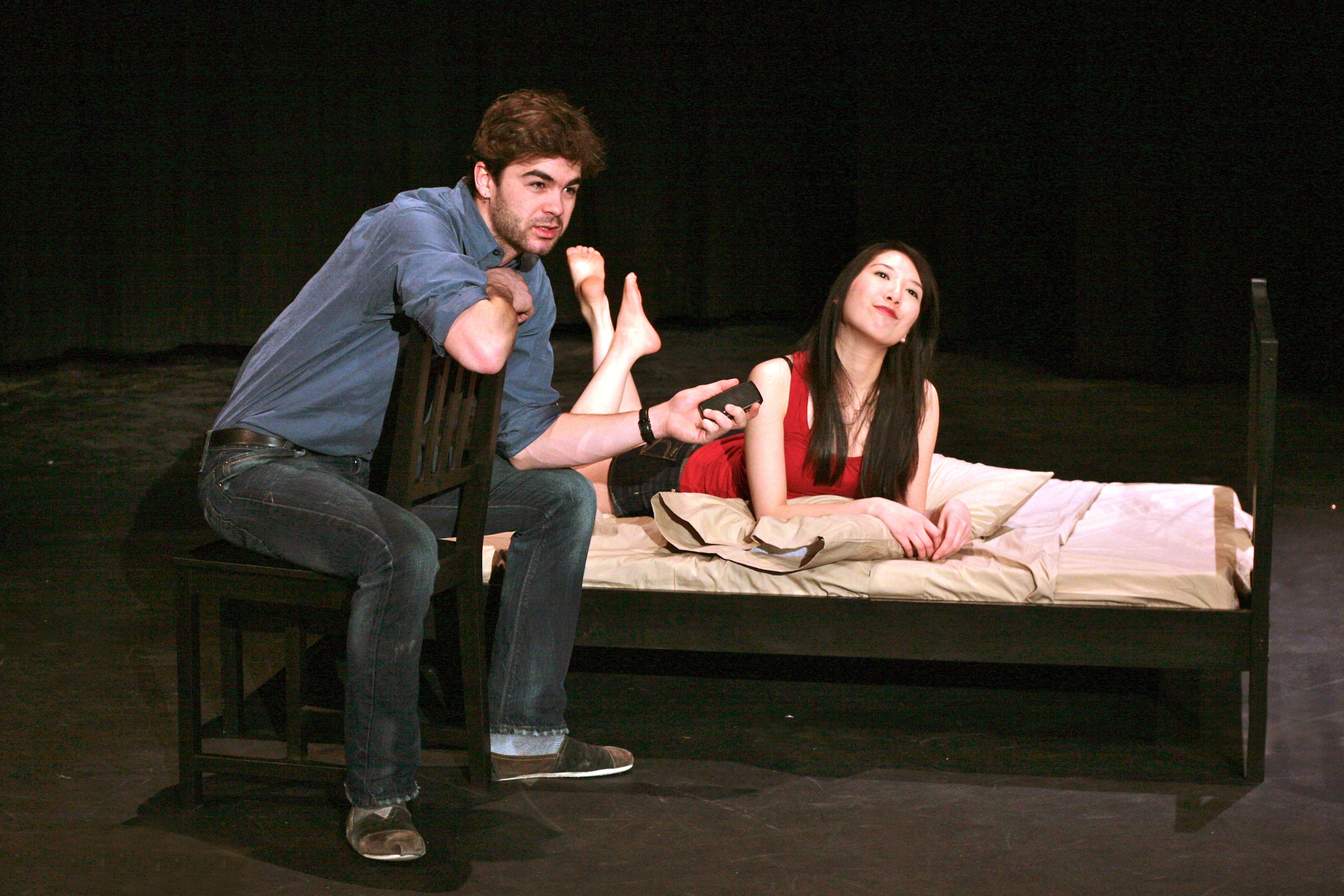 DESPERATE TIMES-- Aaron Krogman and Denise Wong rehearse a scene from She Has A Name