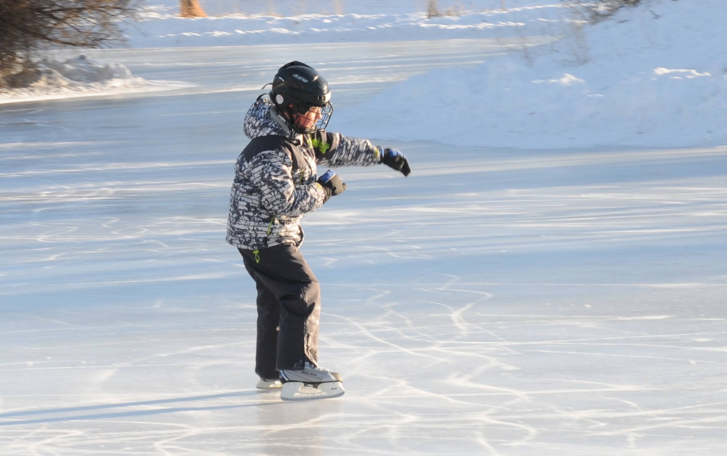 PRACTICE- Brenden Metcalfe skates around Bower Ponds recently while on an outing with his family.