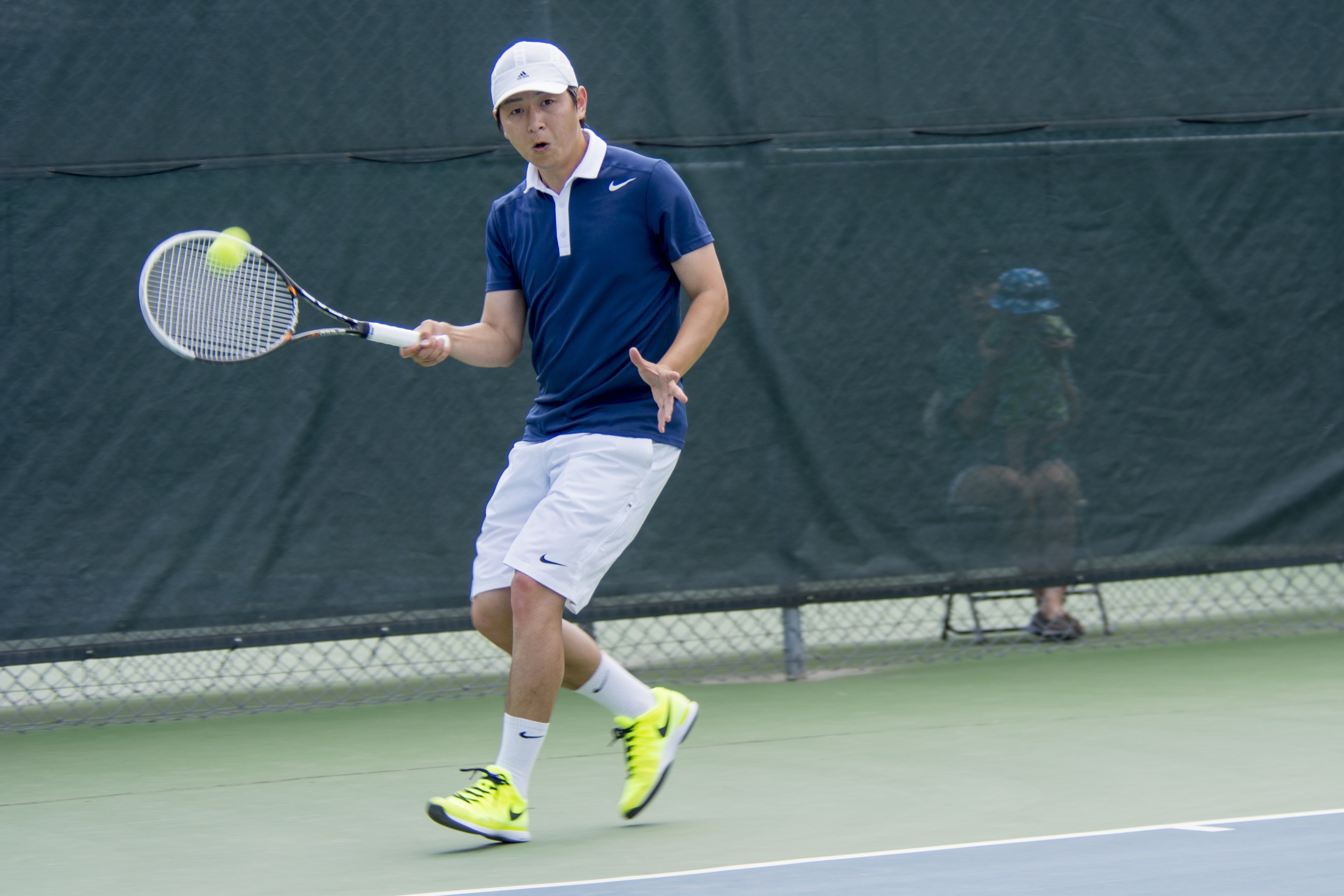 SQUARING OFF – Red Deer Tennis Club member Ki Lee returns the ball during the Play Tennis Provincials held at the Club over the weekend.