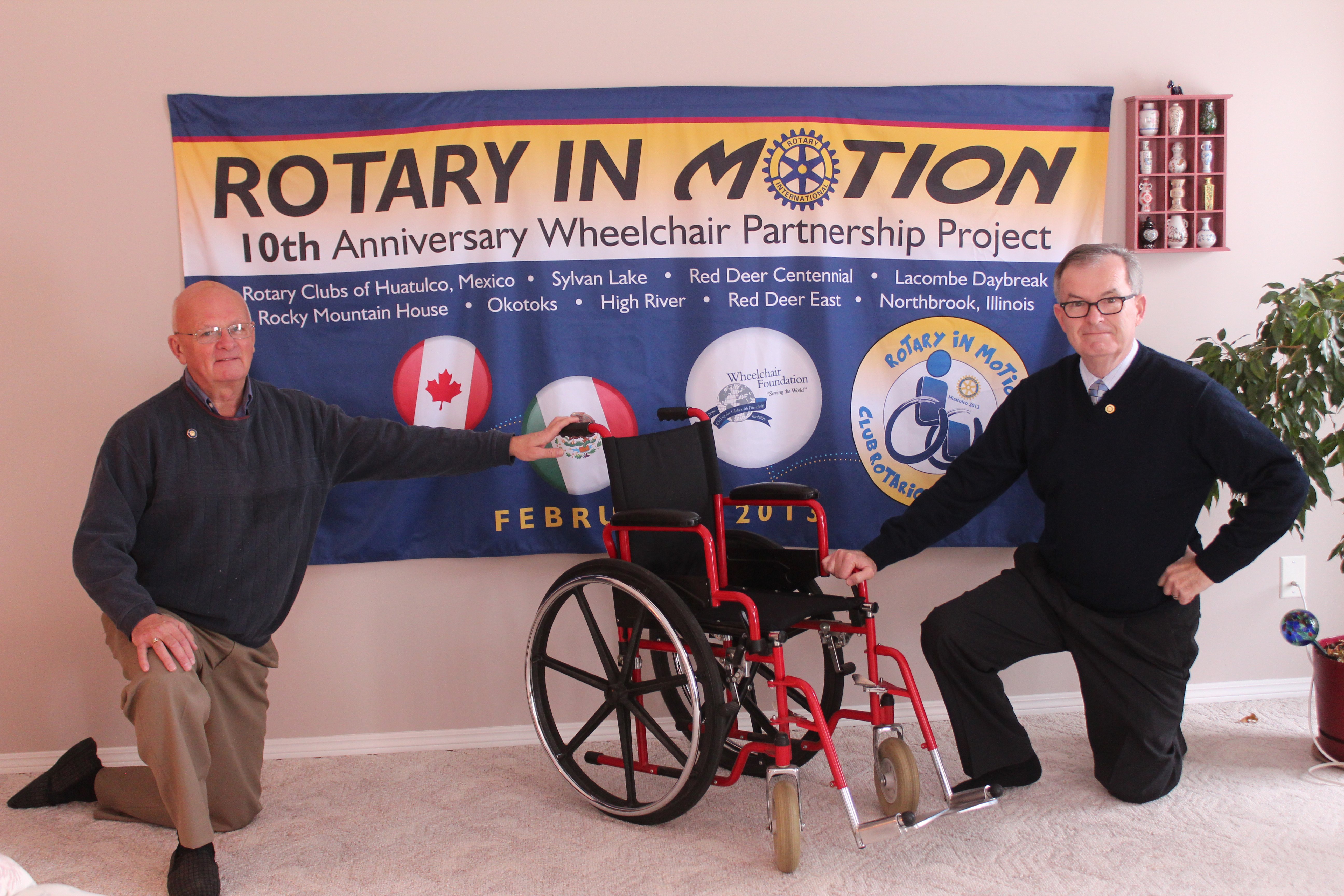 LENDING SUPPORT – Rotary Club members (from left) Neil Swensrude and Garnet Ward