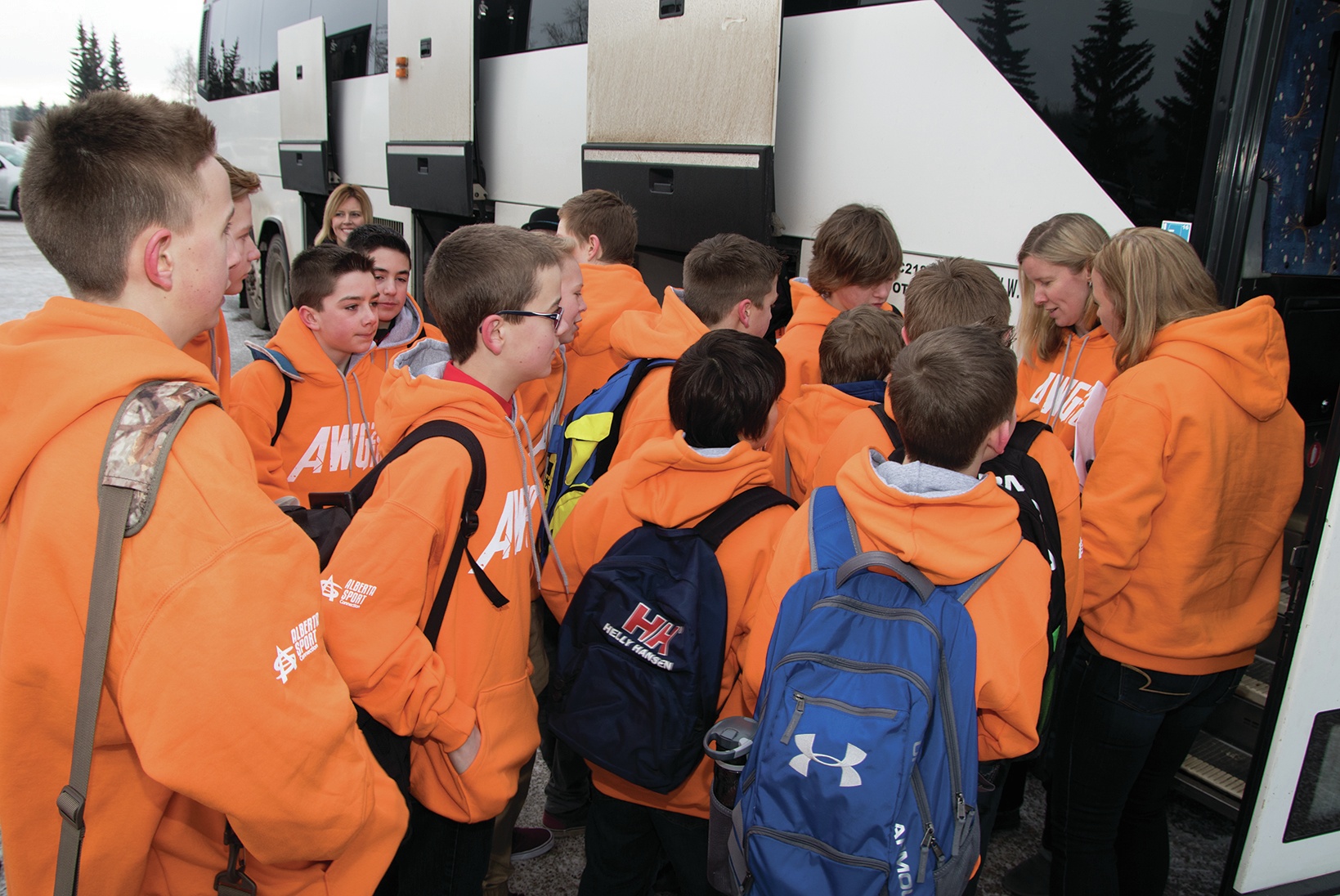 GAME TIME - A group of athletes eagerly awaited their turn to board a charter bus to the 2016 Alberta Winter Games