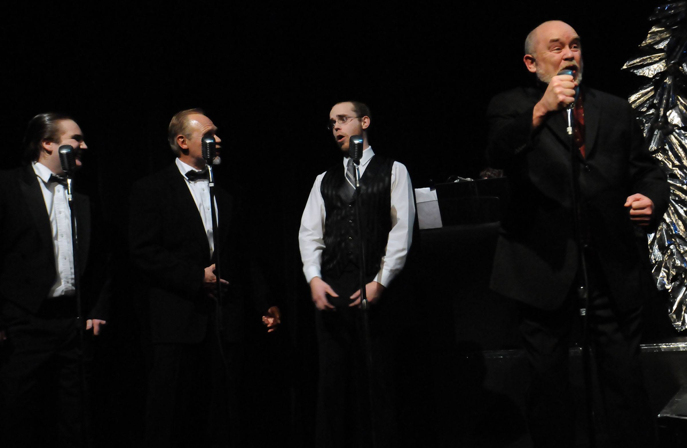 WELCOME GEORGE- Actors rehearse a scene from It’s a Wonderful Life: The Live Radio Drama at the Matchbox Theatre to prepare for their Dec. 9 opening.