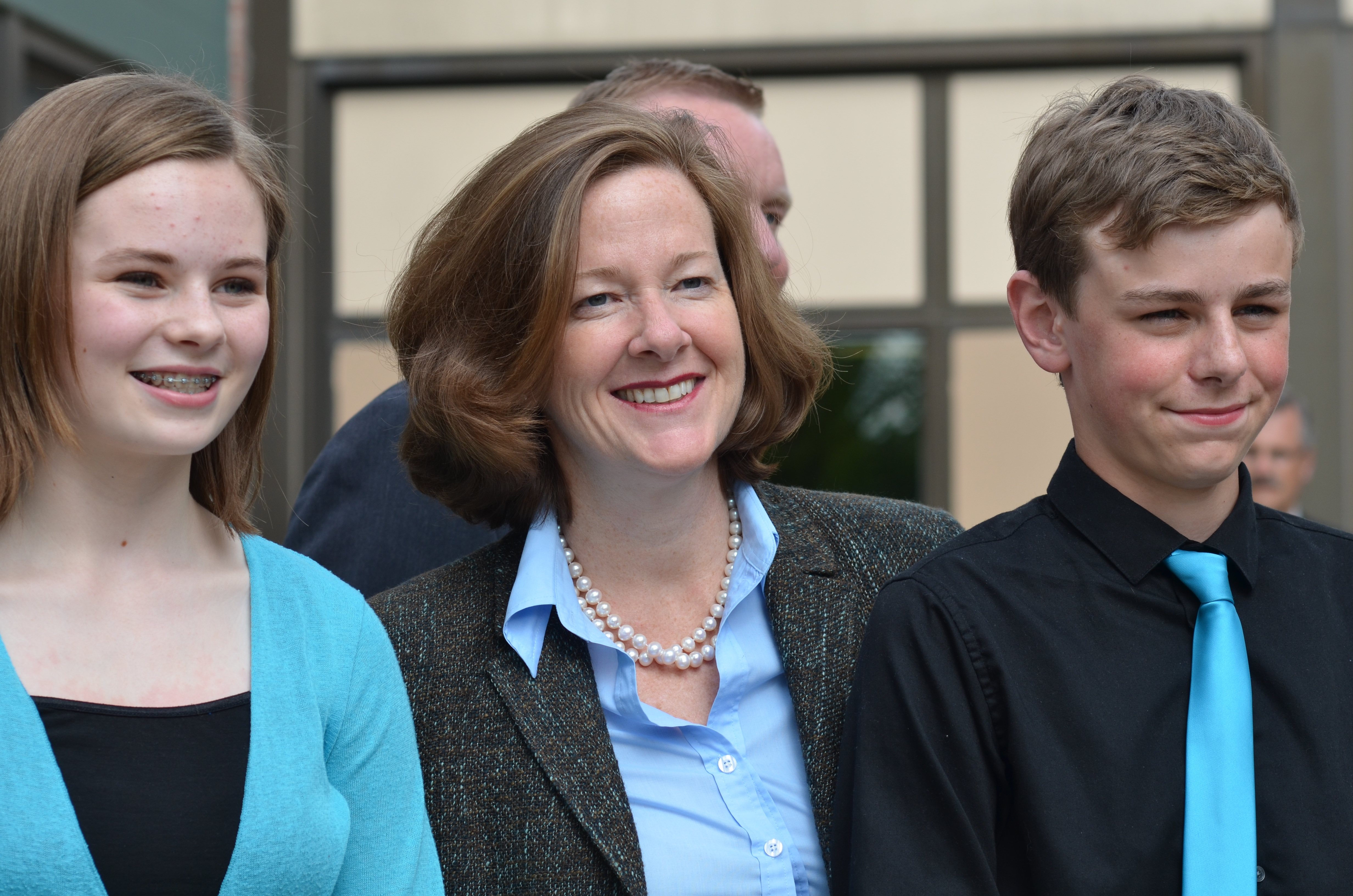 PROUD PREMIER - Premier Alison Redford stands with two of the four students