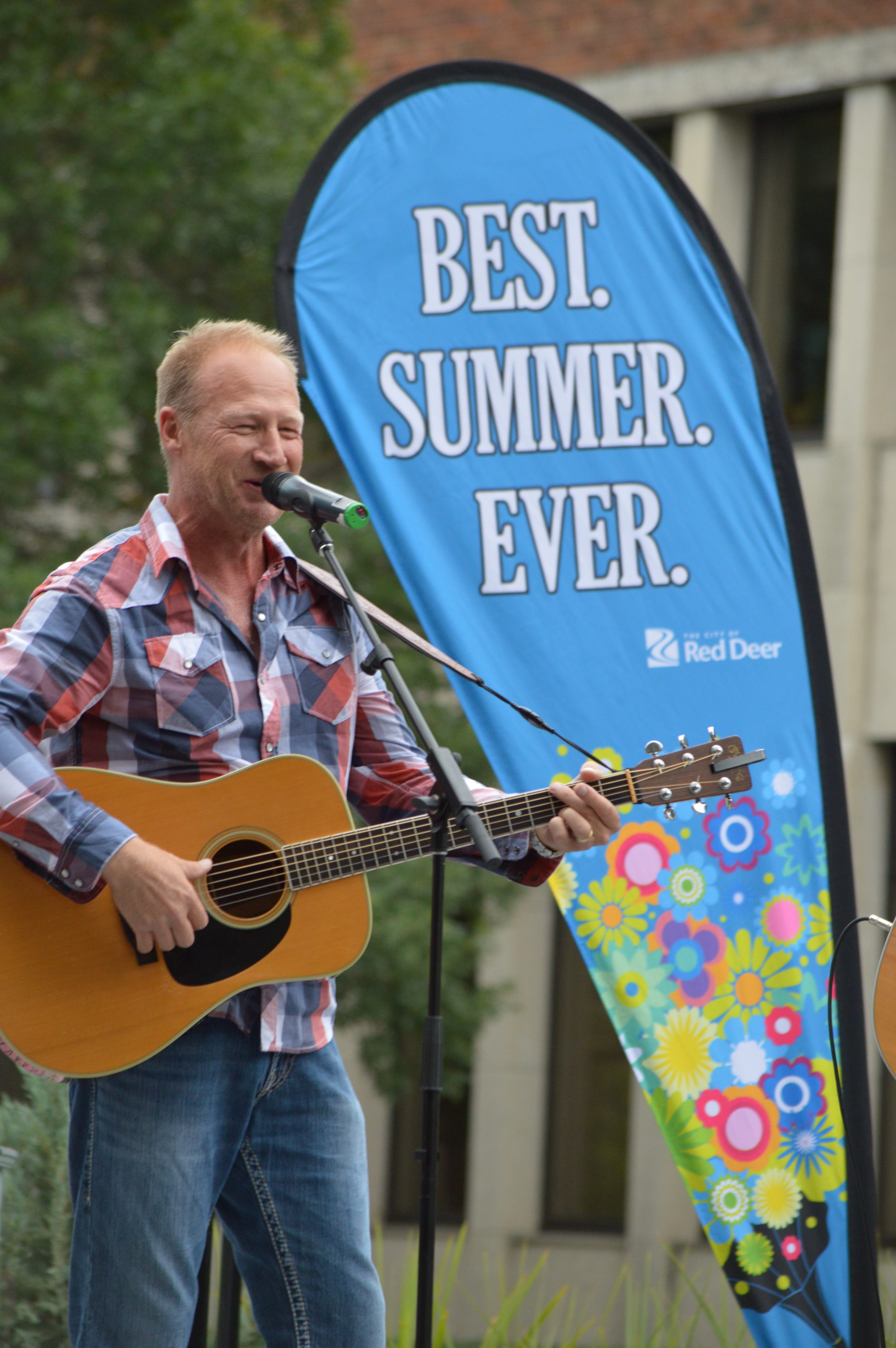 SUPER SUMMER – Duane Steele performs on the Ross Street Patio during a Best Summer Ever event last summer.
