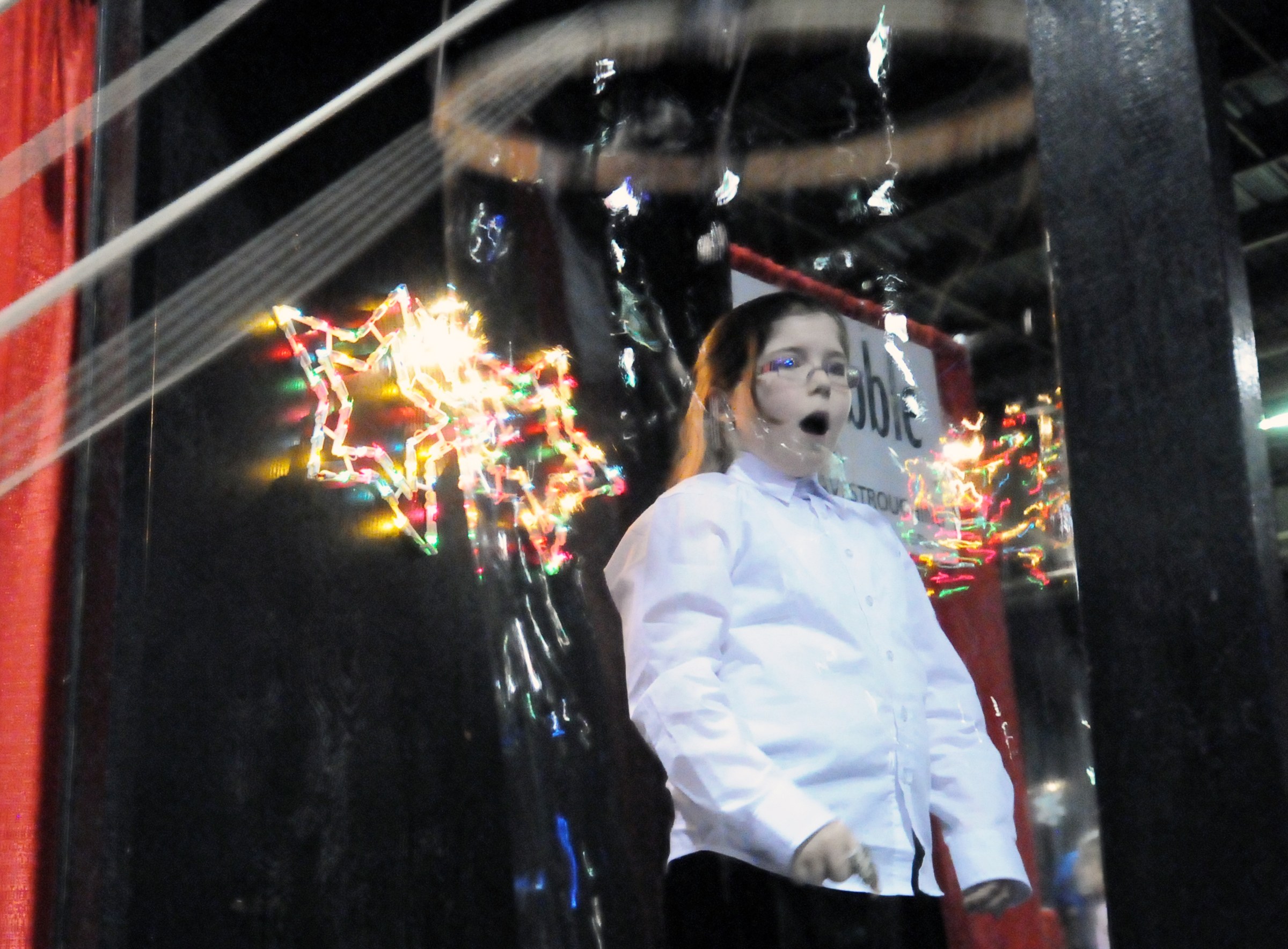 BUBBLE WALL- Wynter Kennedy experiences the bubble wall during the 2010 Festival of Trees at the Westerner this past weekend.