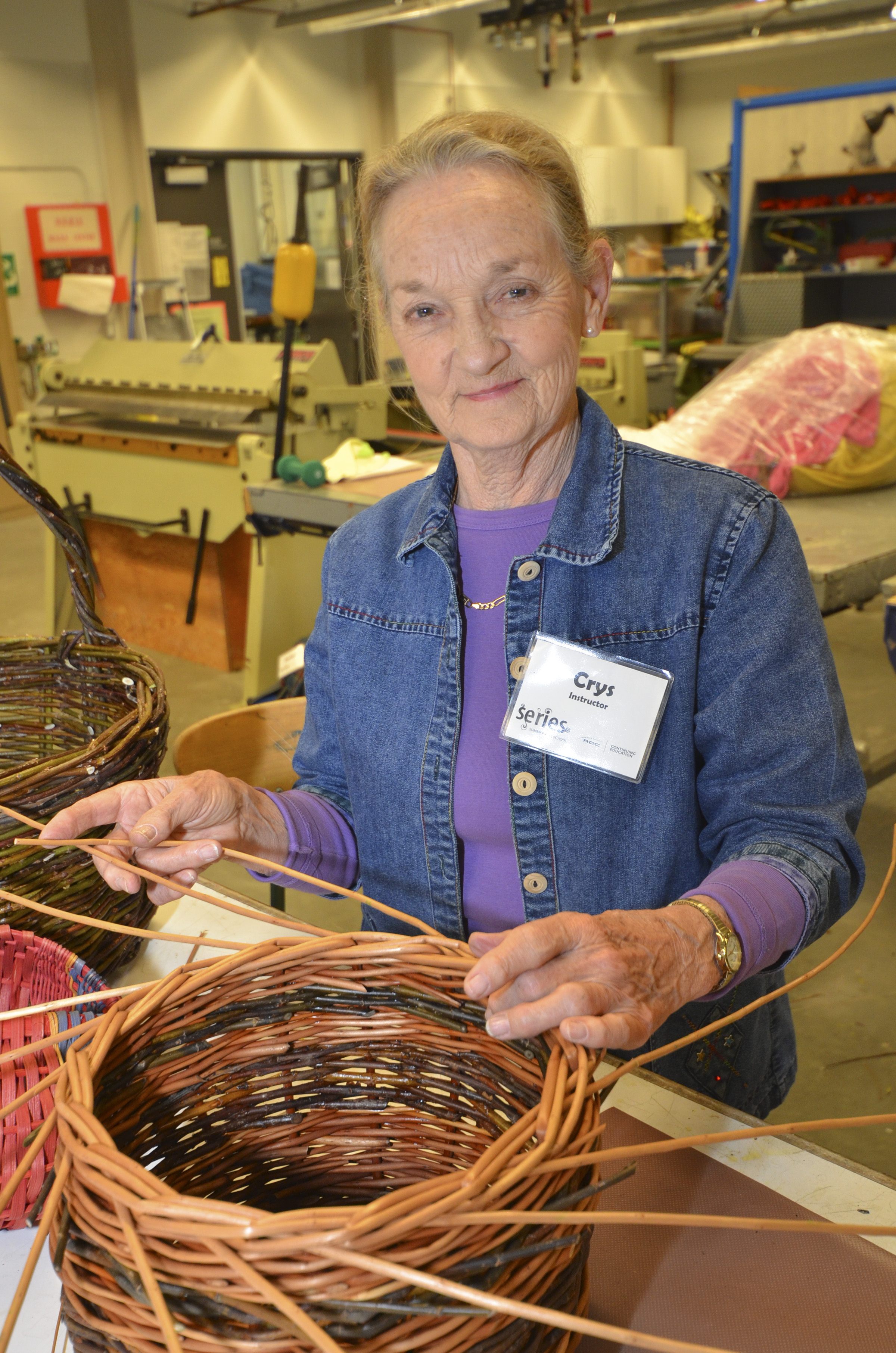 ART FORM – Crys Harse demonstrates the art of basket weaving at Red Deer College last week
