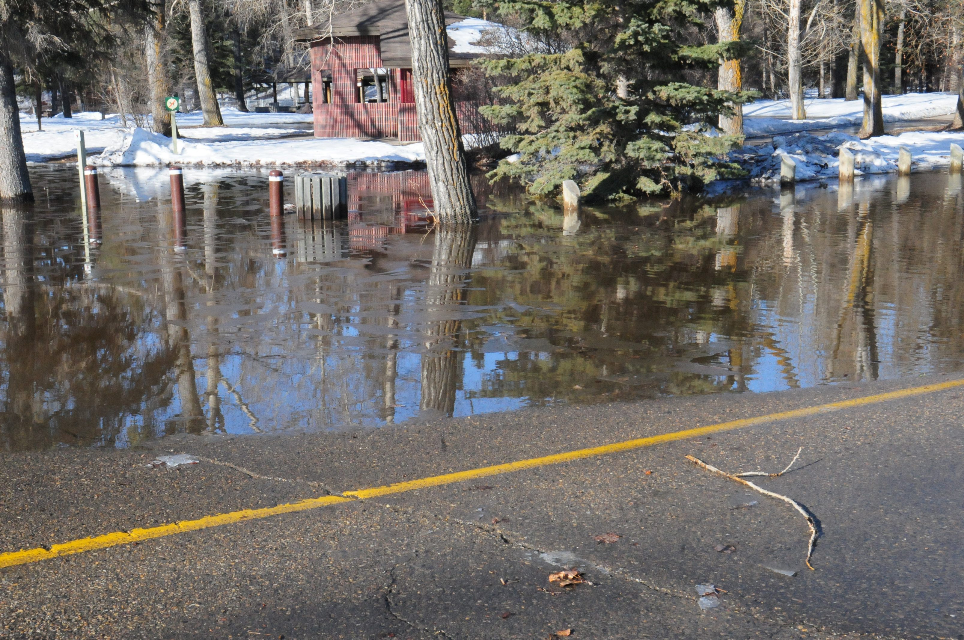 WATER OVERLOAD- Rotary Park was closed off as water blocked the pathway's and flowed over the road Monday morning.