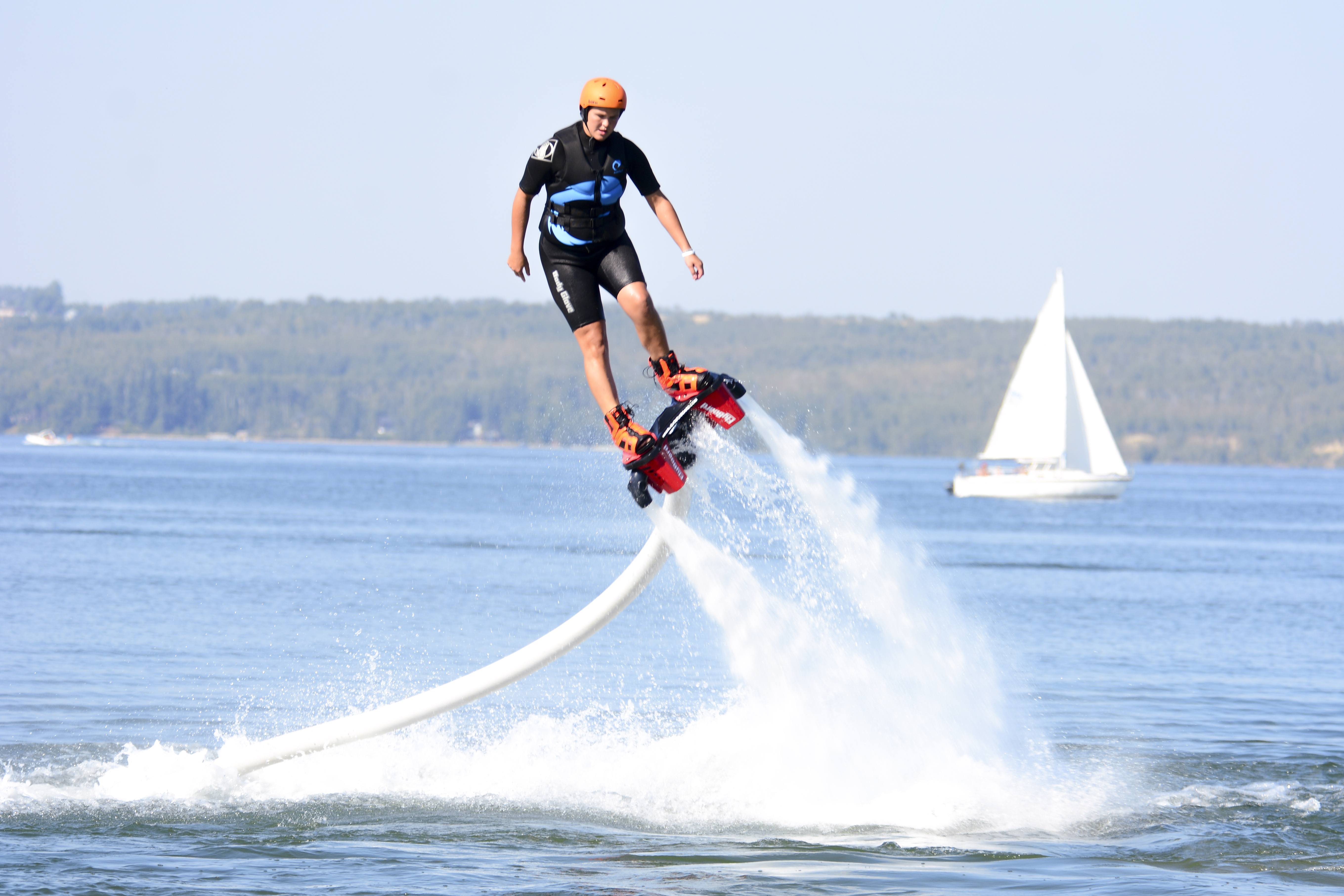 HIGH FLYER – Alberta Flyboarding instructor Nikki Wallace soars above Sylvan Lake.