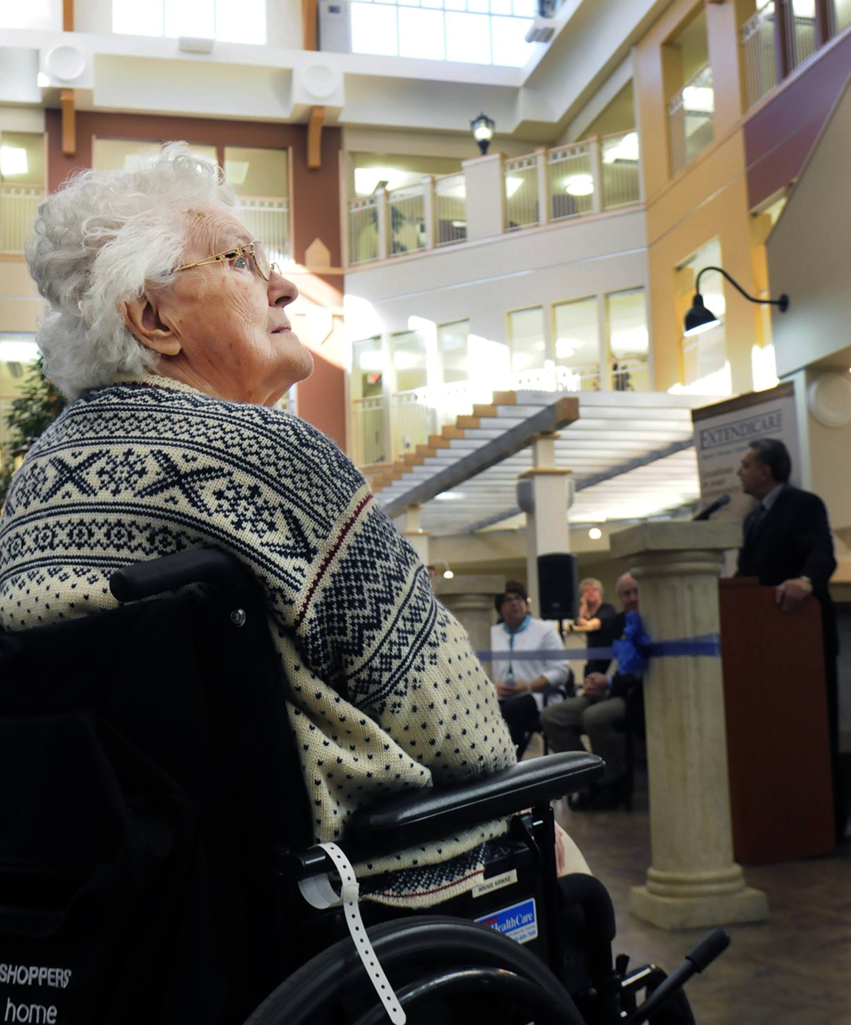 NEW HOME - Winnie Krikke checks out her new home during the ribbon cutting ceremony Monday to officially open the new Extendicare Michener Hill facility in Red Deer.