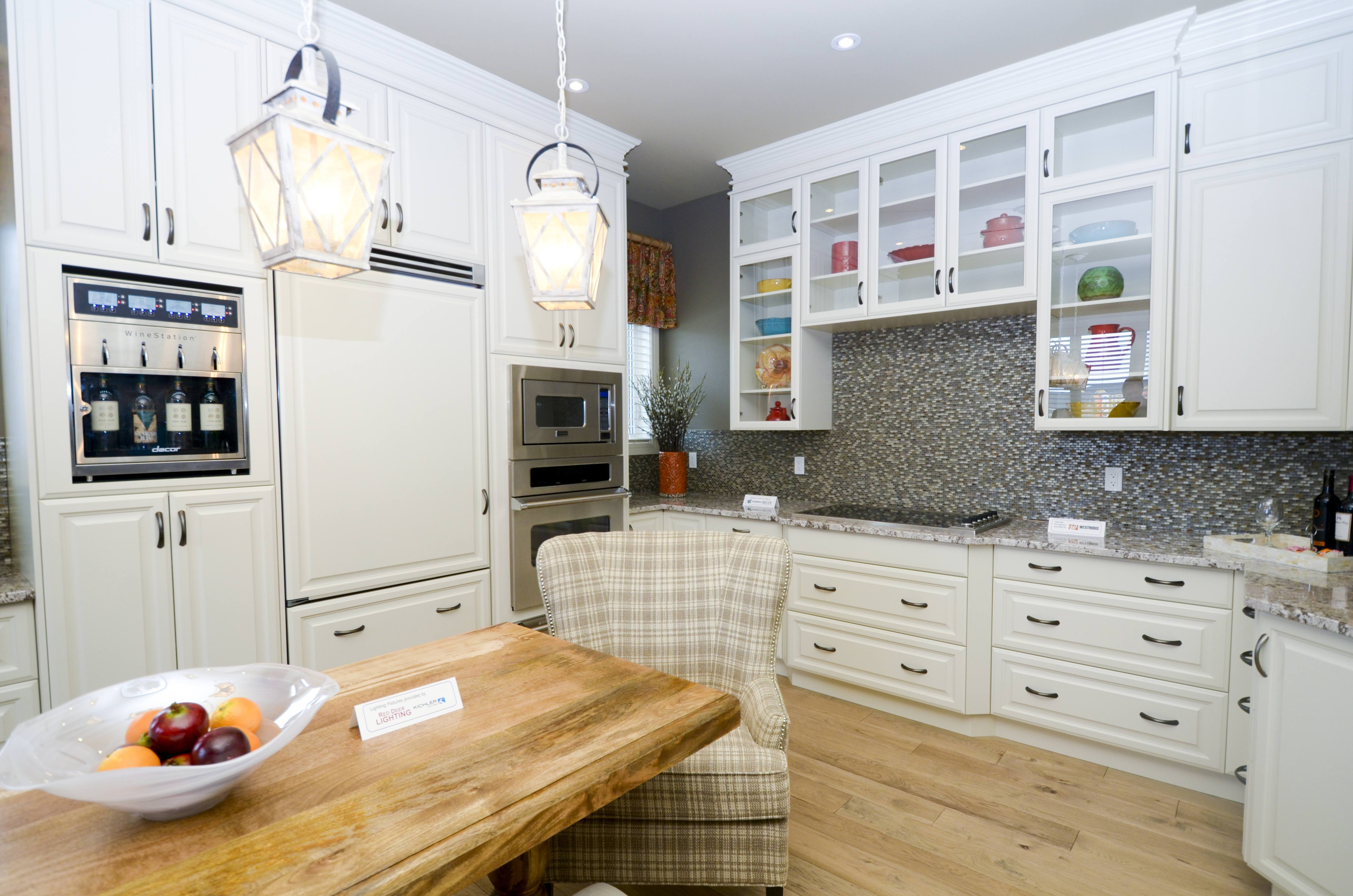 WELCOMING WHITE – This clean-cut kitchen of the Hospitals’ Lottery dream home built by Abbey Master Builders could be yours if you buy a ticket.
