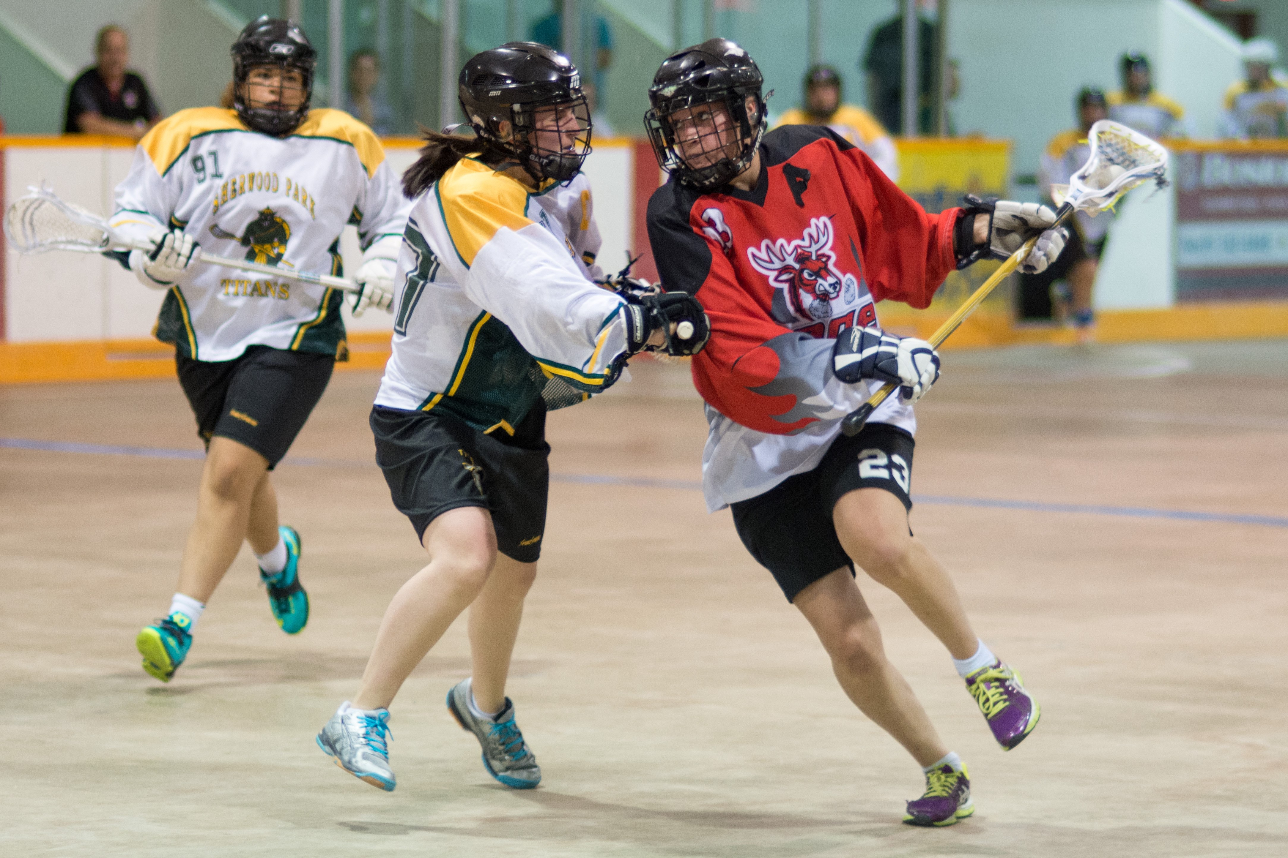 SHOWDOWN – Paige Sweetnam of the Red Deer Rage Sr. Women’s lacrosse team takes on a pair of Sherwood Park Titans this past Sunday at the Kinex Arena.