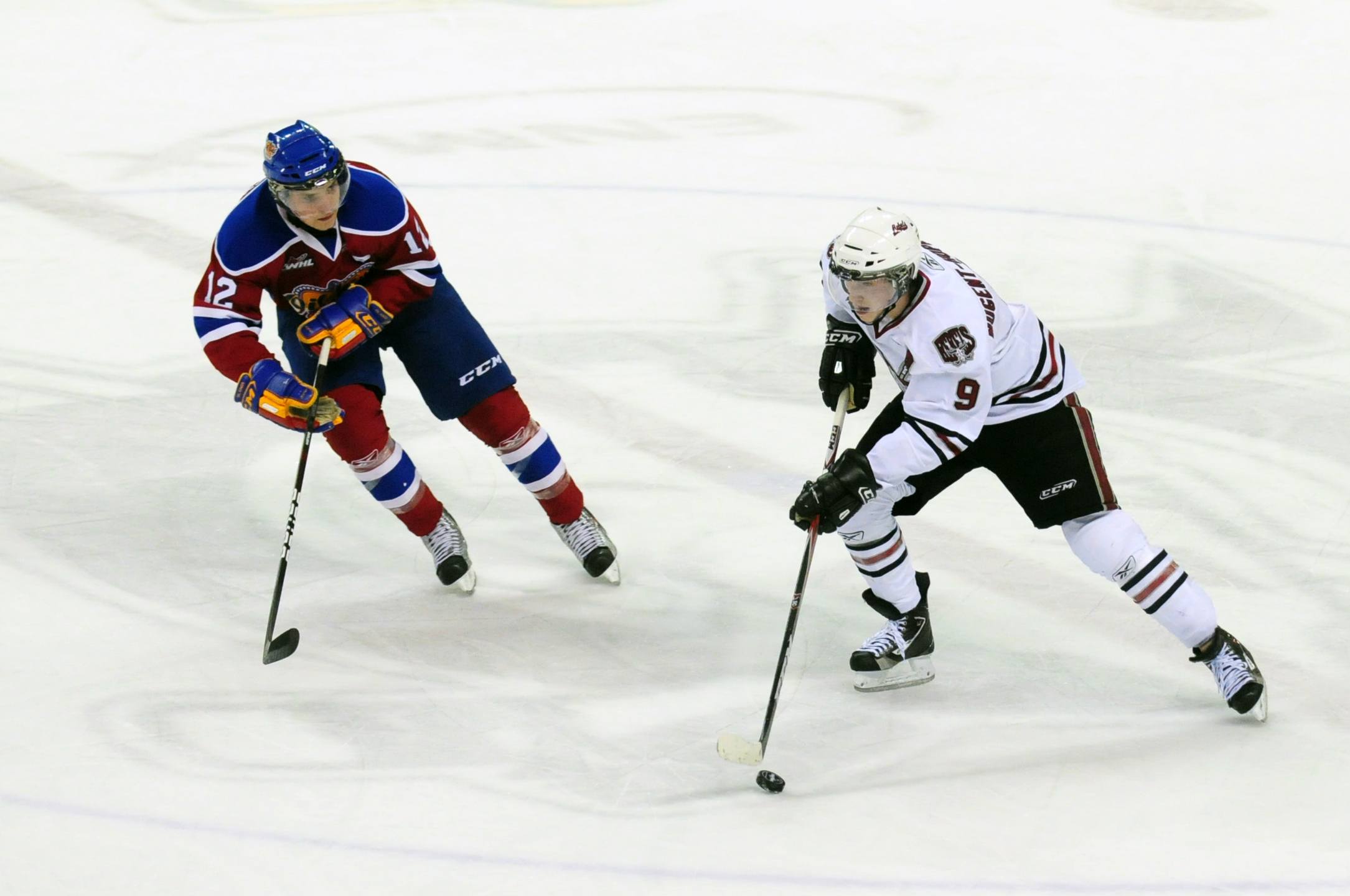 PASS- Red Deer Rebel Ryan Nugent-Hopkins guides the puck down the ice during WHL action Friday night against the Edmonton Oil Kings. The Rebels won 5-3 and play again tonight against the Oil Kings at 7:30 p.m. at the Centrium.