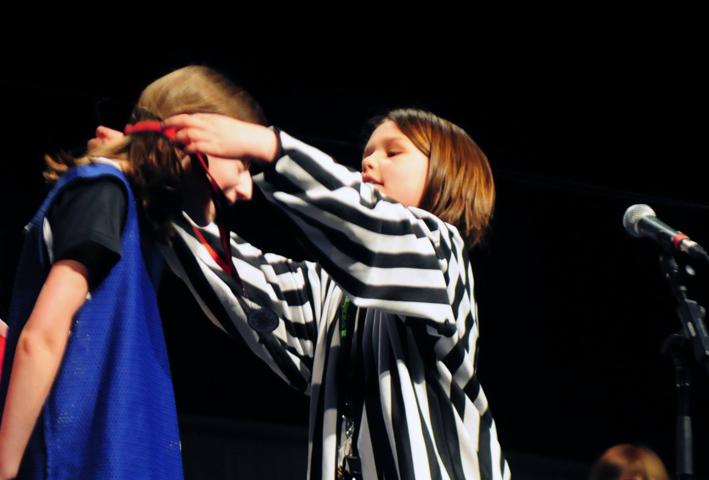 WINNER- Shyla Milinazzo a grade 3 student from Ecole Mountview School played the referee during the performance of “Go for the Goal” at the CrossRoads Church Monday afternoon.The entire student body was also apart of the play by singing as well as performing.