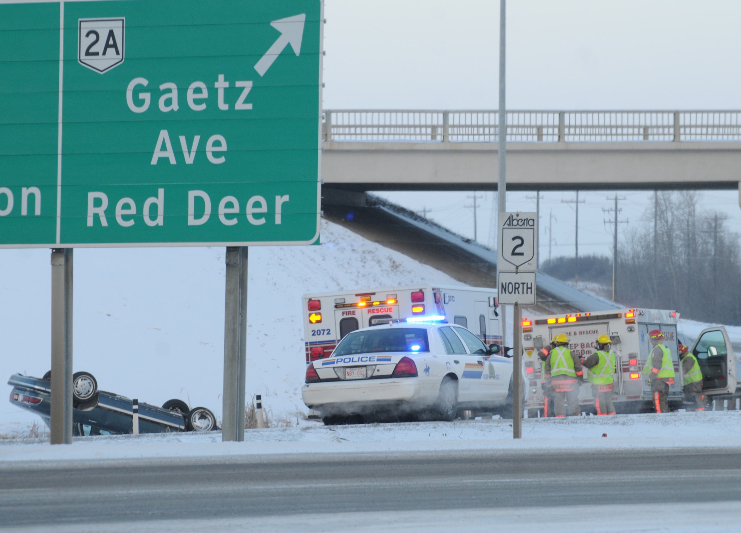 CAUSING DELAYS- A rollover just north of Gasoline Alley on the QEII Hwy. had Red Deer Emergency Service crews busy cleaning up Thursday morning.